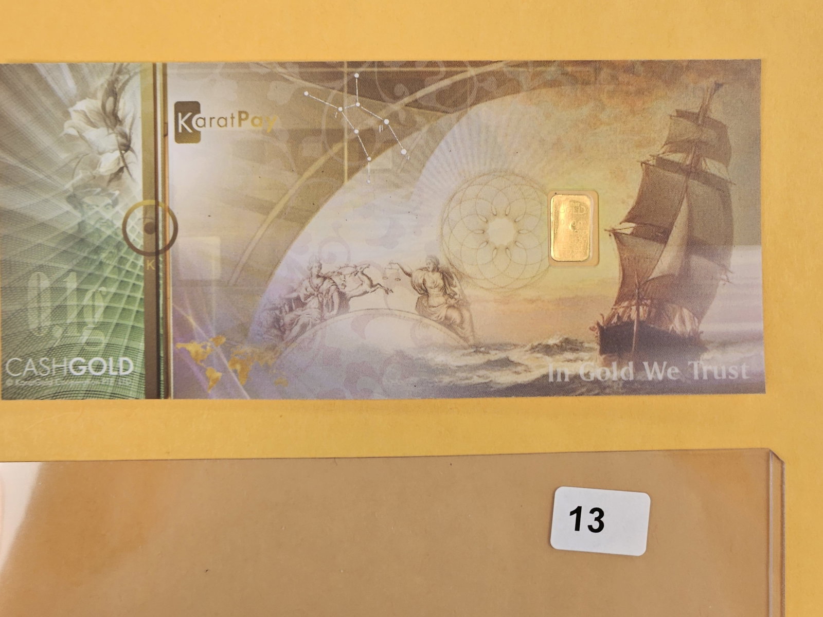 GOLD! KARATBARS CashGold .9999 fine Gold bar: In a polymer note. Weighs .1 grams