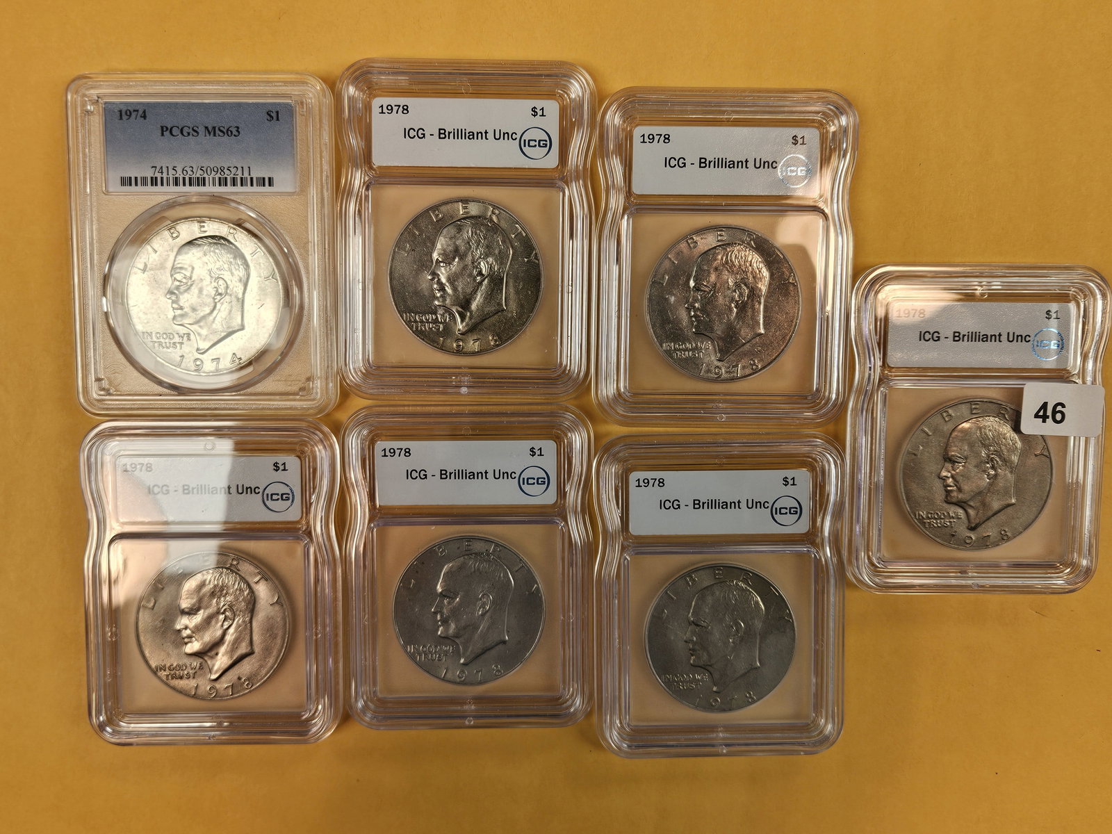 Seven graded, Brilliant Uncirculated, Eisenhower Dollars: 1974 and 1978