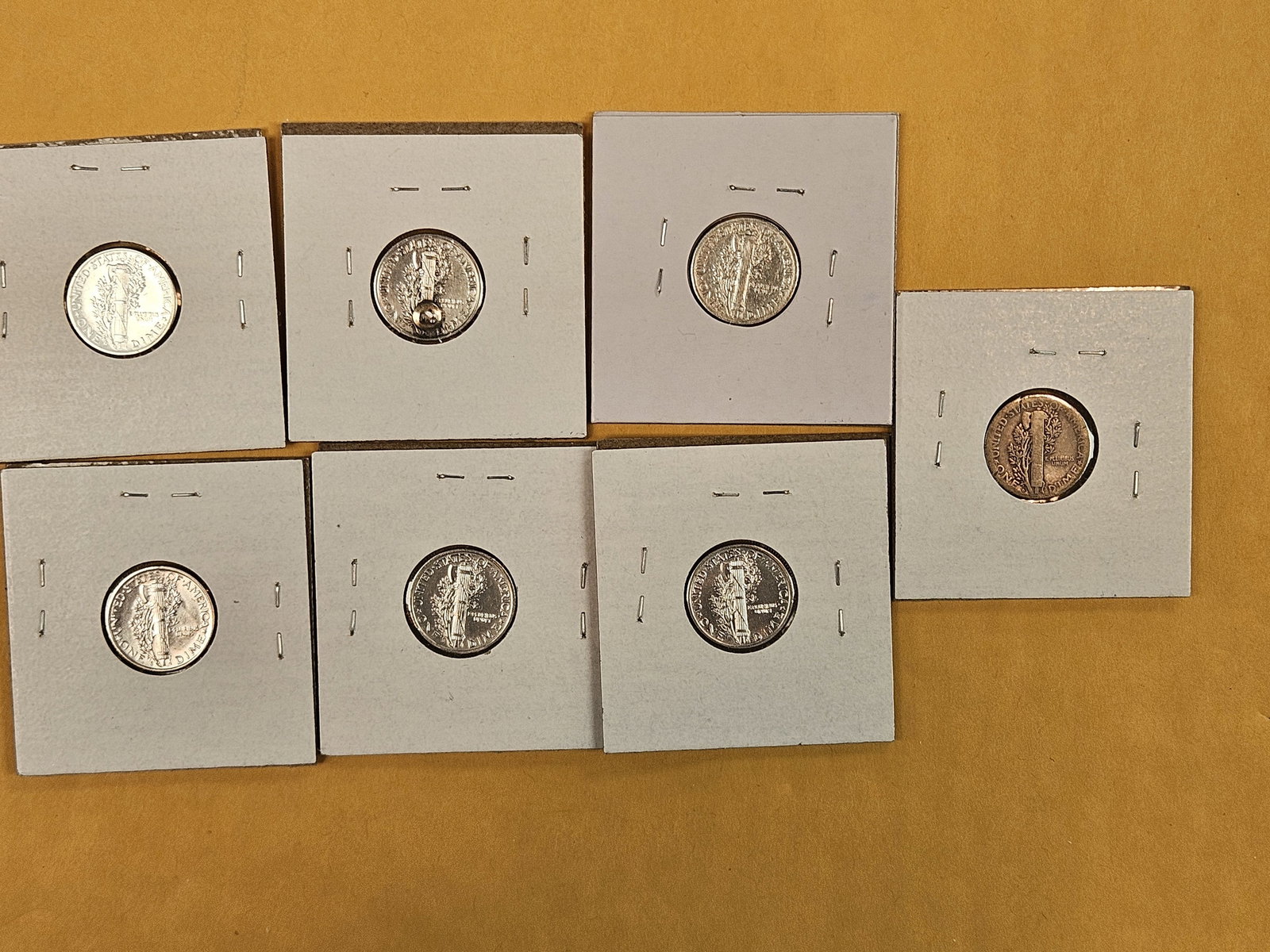 Seven mixed silver Mercury Dimes - 3