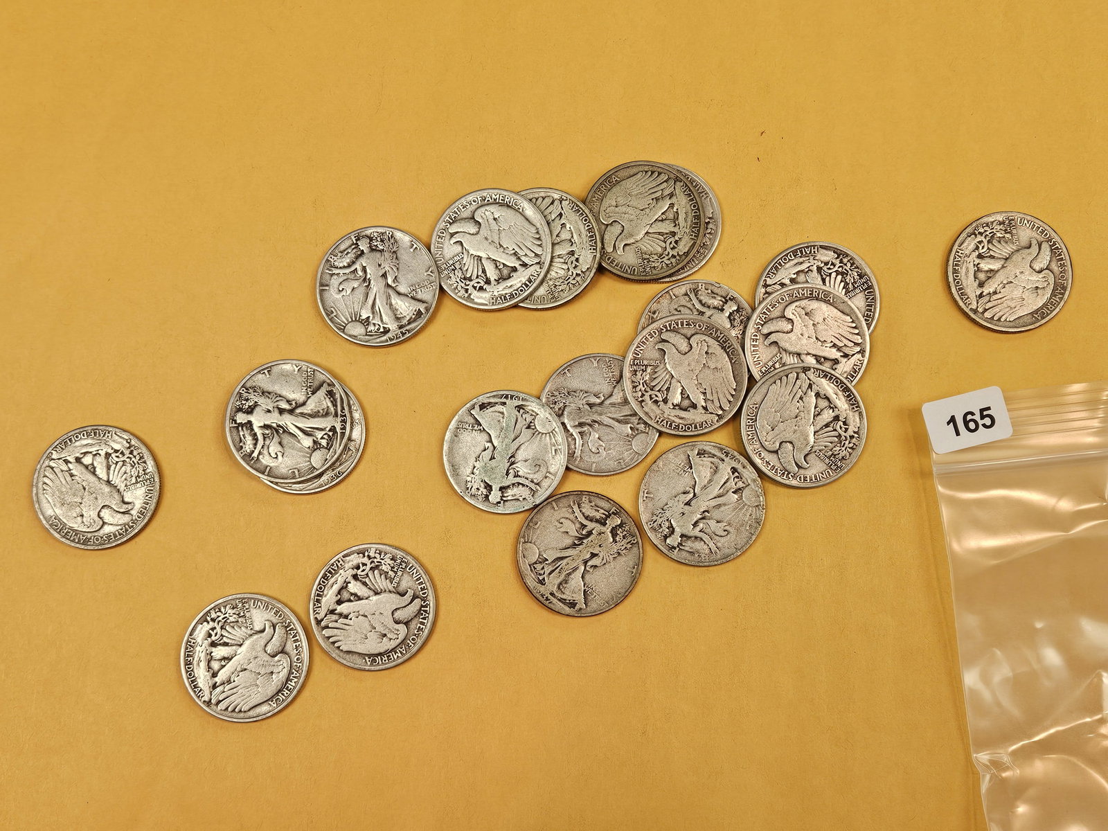 Twenty mixed silver Walking Liberty Half Dollars: Circulated
