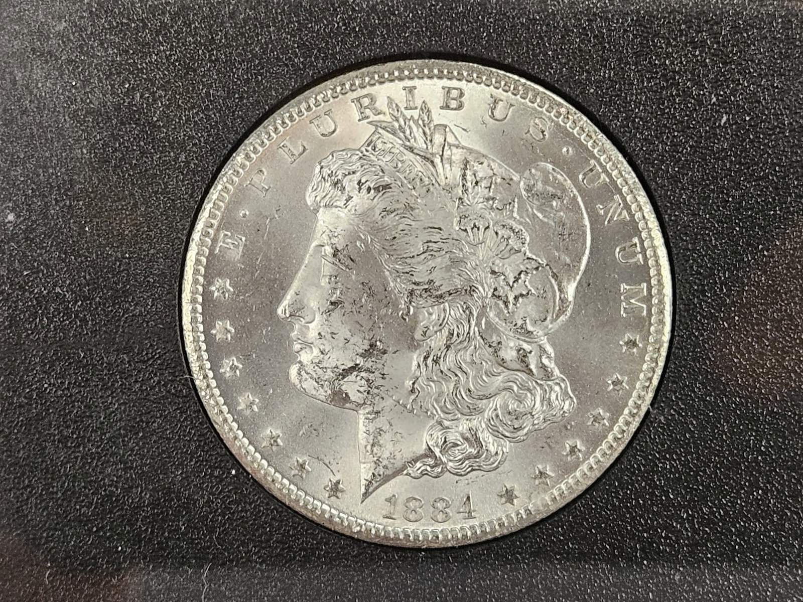 ** KEY DATE ** GSA 1884-CC Morgan Dollar in Choice Brilliant Uncirculated: KEY DATE! CARSON CITY! In original GSA hard pack. No outer box or COA. Sharp, frosty and great contrast