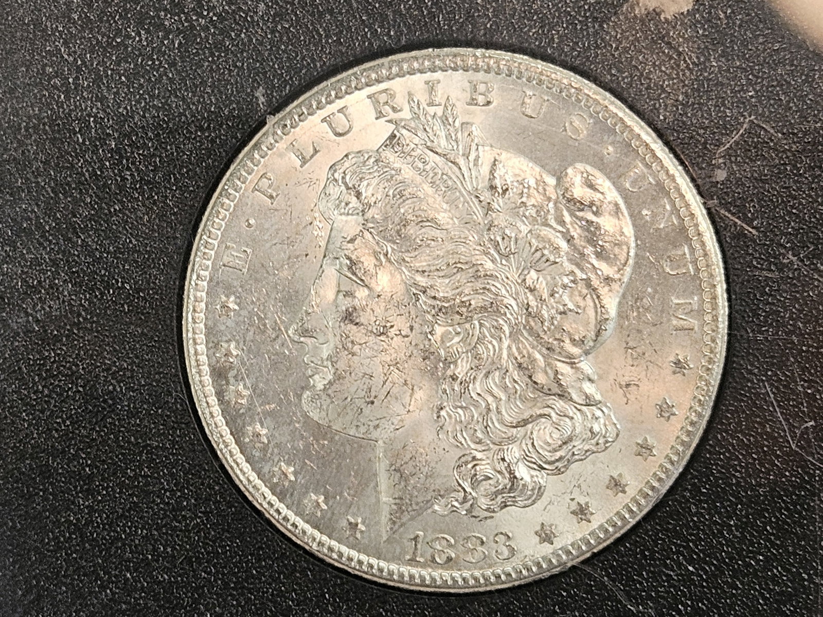 ** KEY DATE ** GSA 1883-CC Morgan Dollar in Brilliant Uncirculated: KEY DATE! CARSON CITY! In original GSA hard pack. No outer box or COA.
