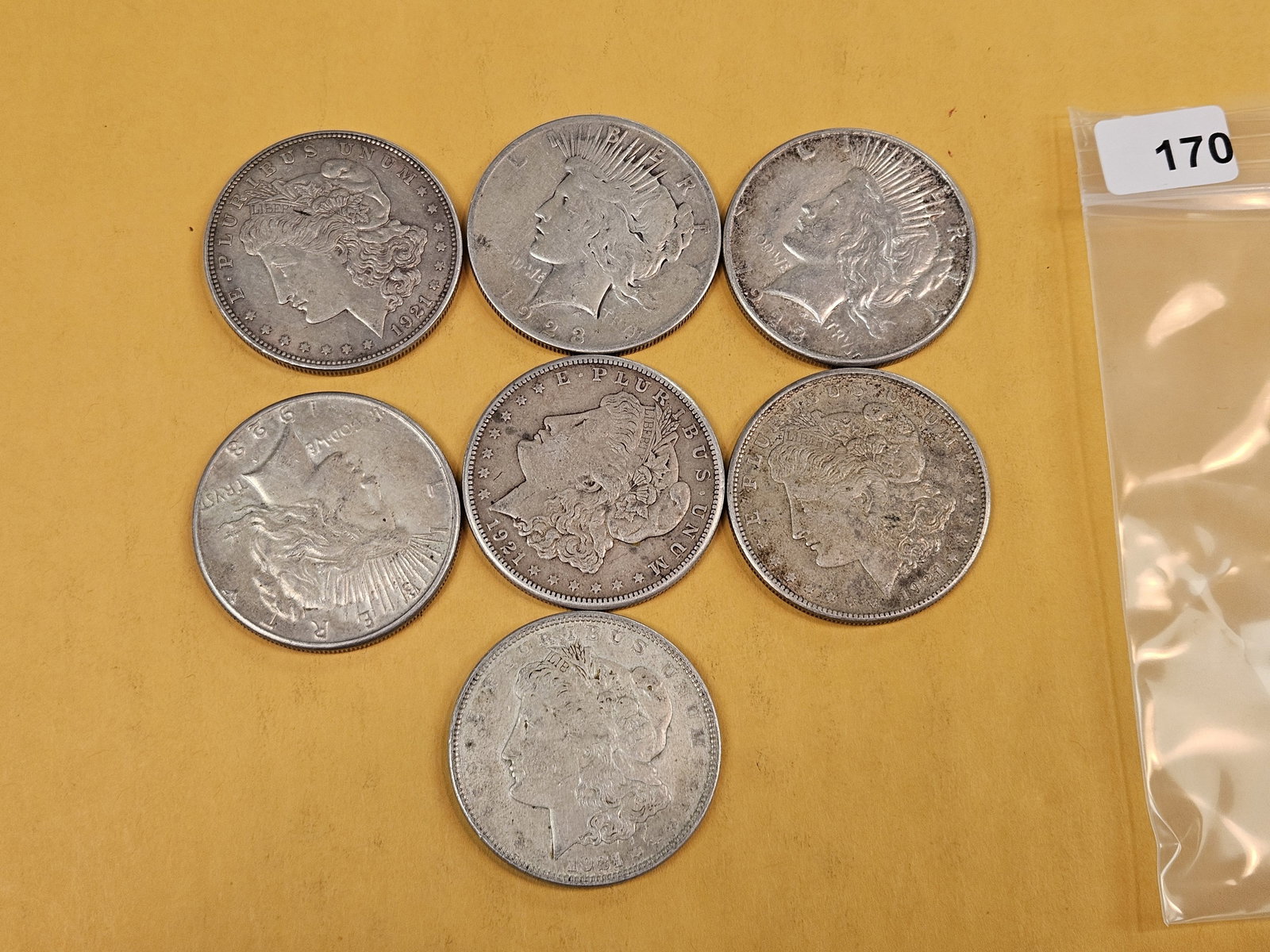 Seven mixed Peace and Morgan silver Dollars - 2
