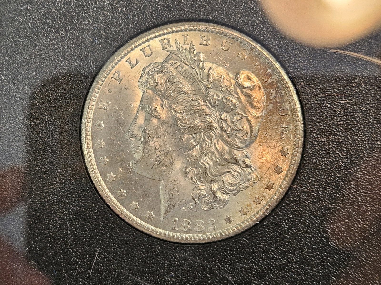 ** KEY DATE ** GSA 1882-CC Morgan Dollar in Brilliant Uncirculated: KEY DATE! CARSON CITY! In original GSA hard pack. No outer box or COA. Starting to tone