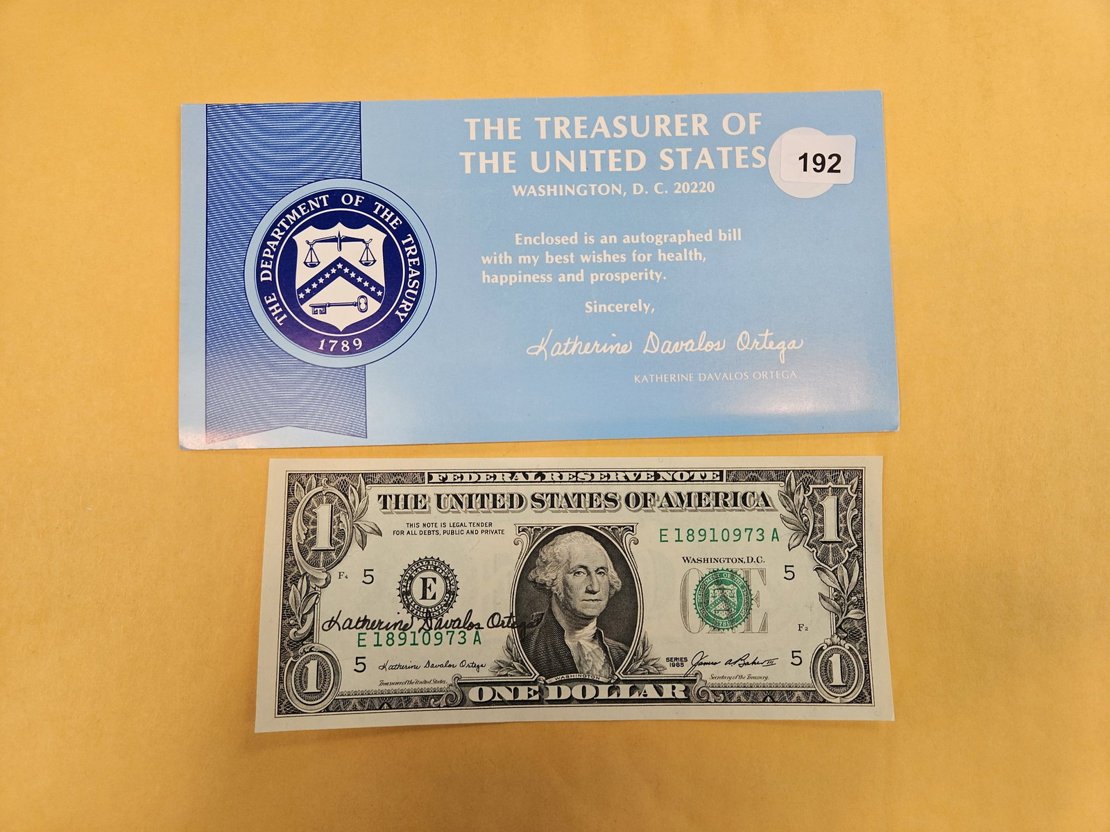Crisp Uncirculated Series 1985 One Dollar FRN: one dollar short snorter signed by the treasurer of the united states katherine ortega. She was treasurer from 1983-1989