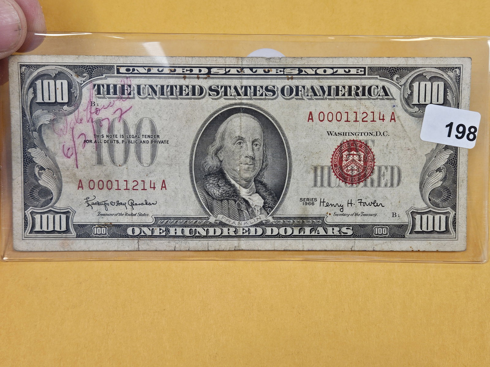 Series 1966 ONE Hundred Dollar RED Seal US note: Has writing on the front