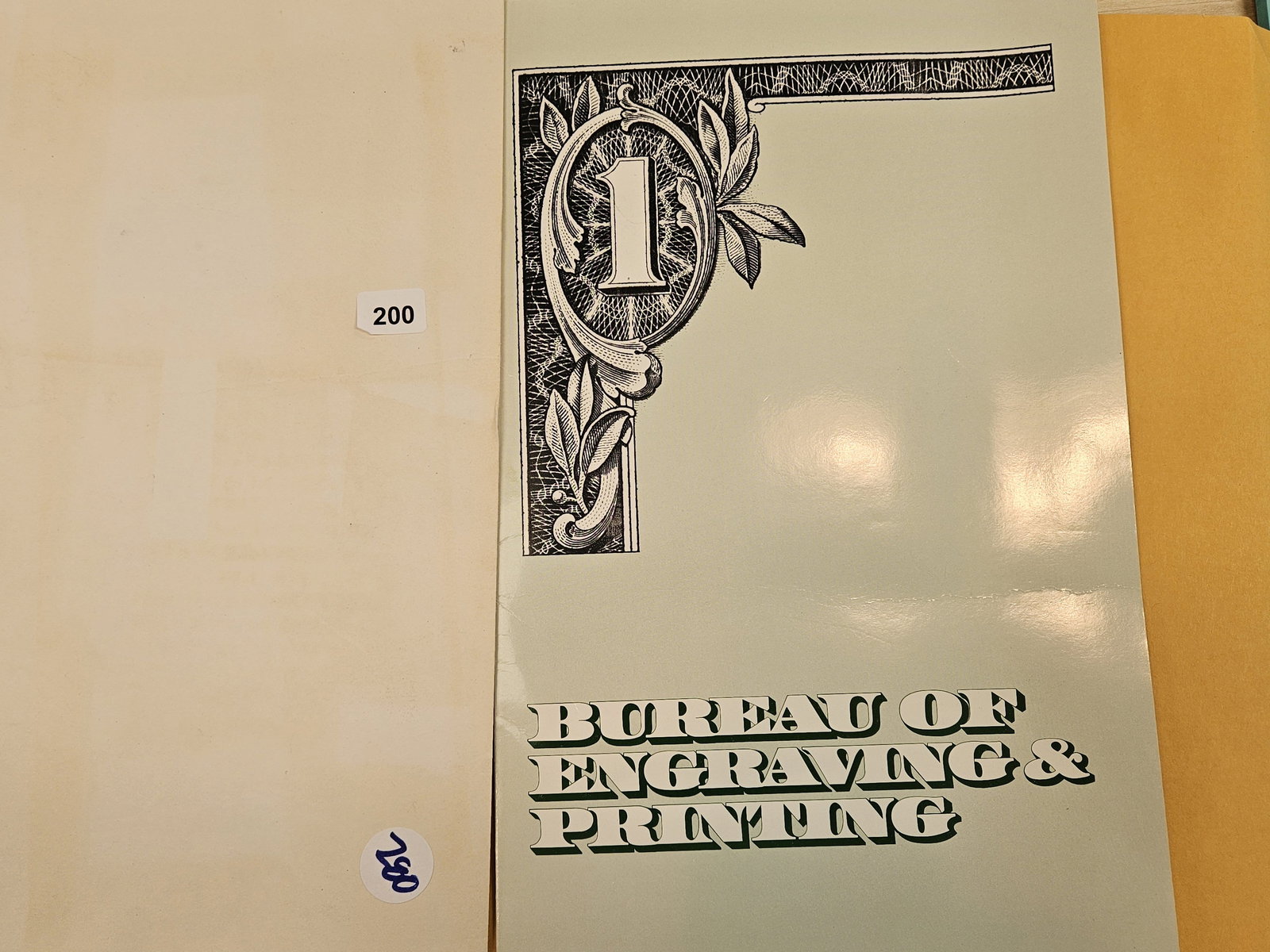 Crisp Uncirculated, Uncut, Sequential, Sheet of One Dollar US Notes: St Louis. In original BEP folio