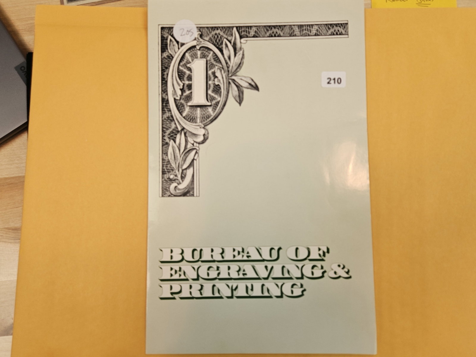 Crisp Uncirculated, Uncut, Sequential, Sheet of One Dollar US Notes: St Louis. In original BEP folio