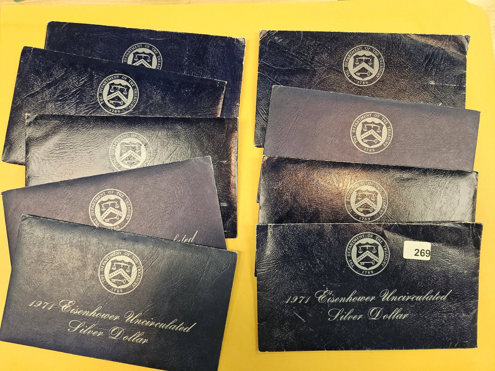 Nine Brilliant Uncirculated Silver Eisenhower Dollars: Blue Ikes. All in OGP