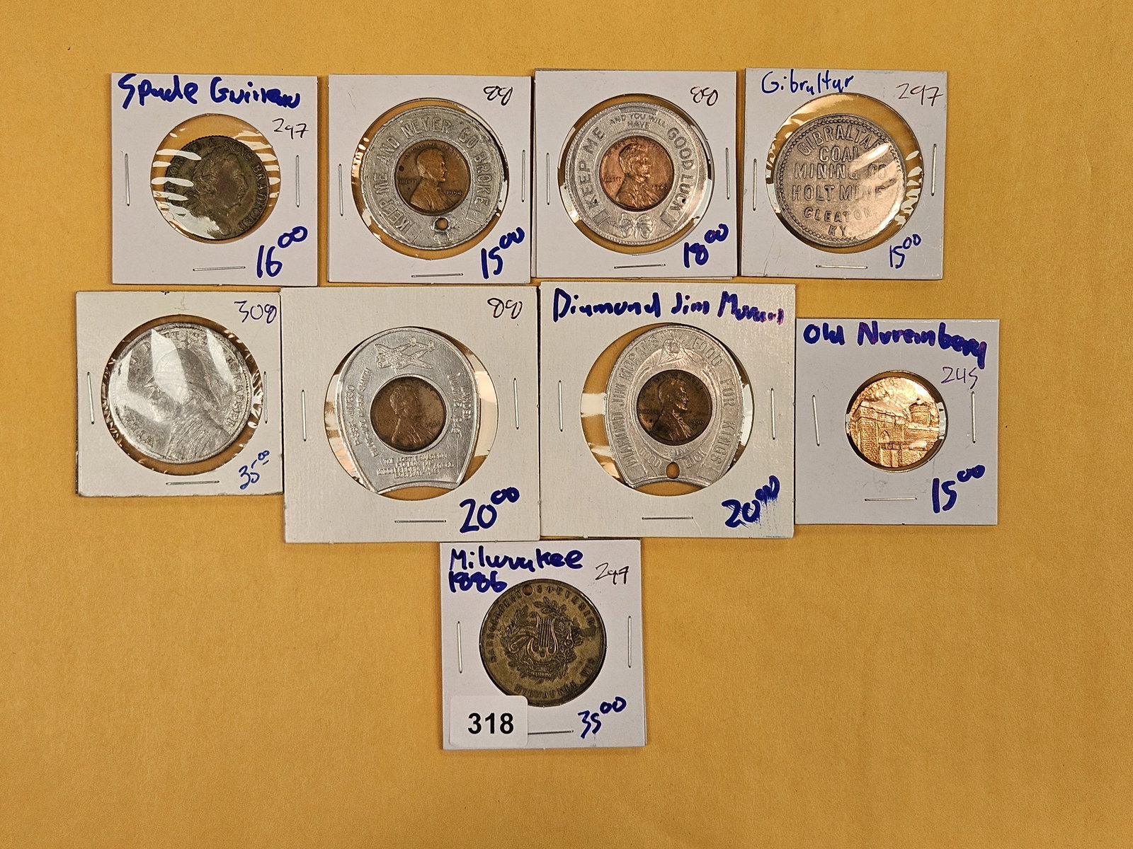 Nine very cool, mixed, pieces of exonumia: Encased Cents, and tokens from the 1800's!