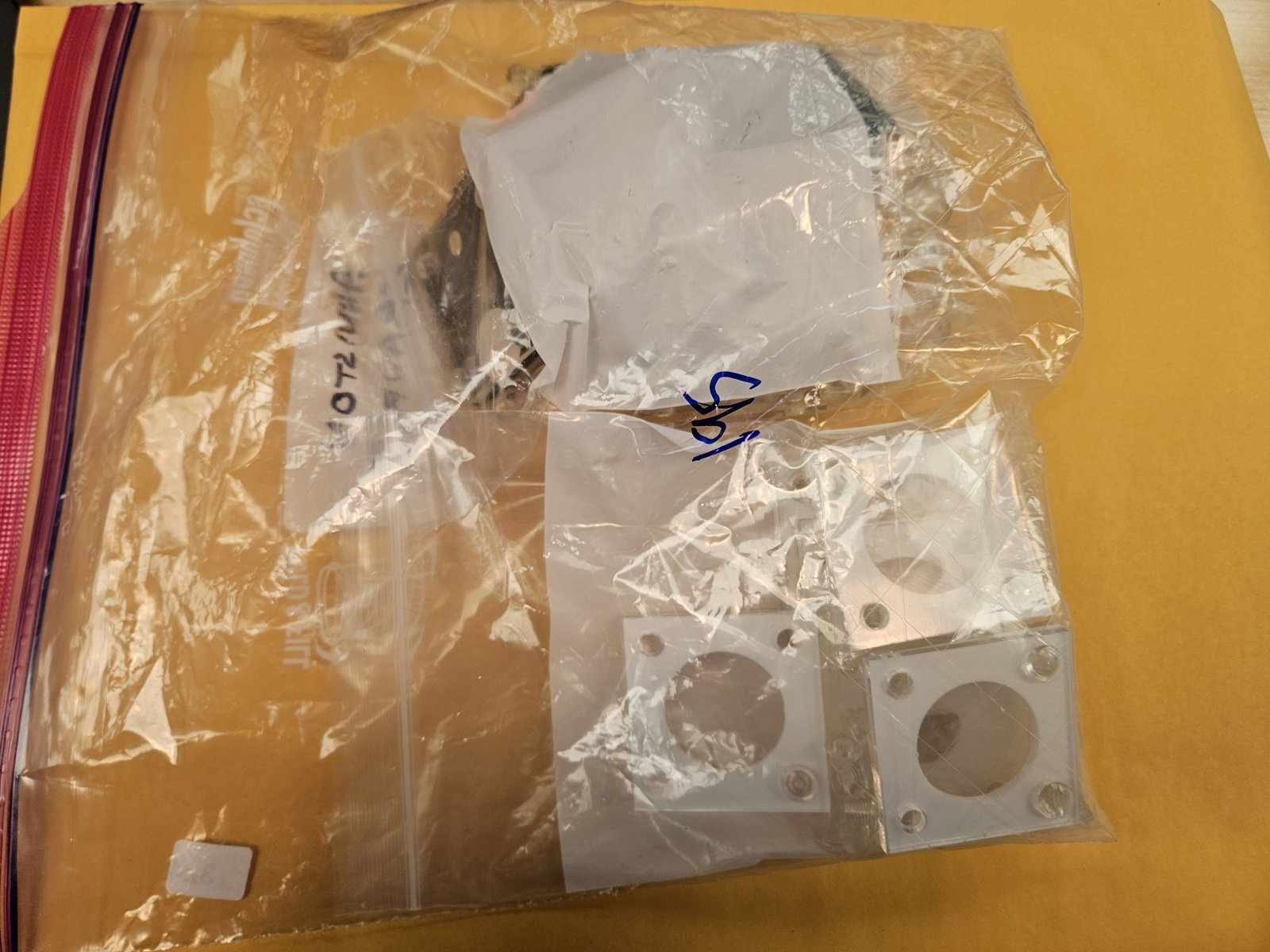 Ziploc bag full of Capitol Plastic holders - 2