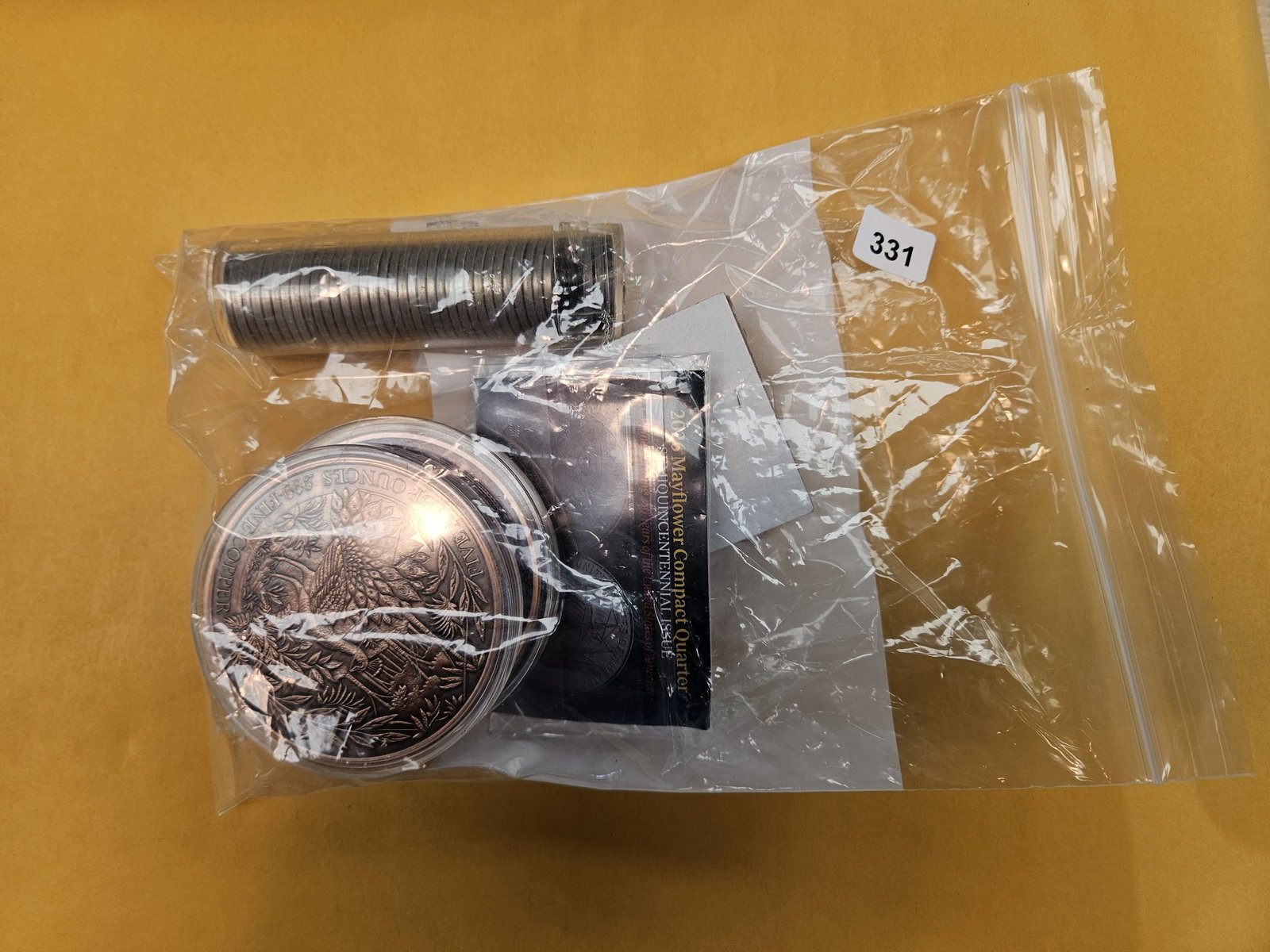 Hodge-podge lot: 2- 5 OUNCE COLORIZED COPPER ROUNDS, 2026 MAYFLOWER QUARTER THAT IS RUTHENIUM PLATED, 1 GRAM GEIGER SILVER, AND A BU SOLID DATE 1968-D JEFFERSON NICKEL ROLL
