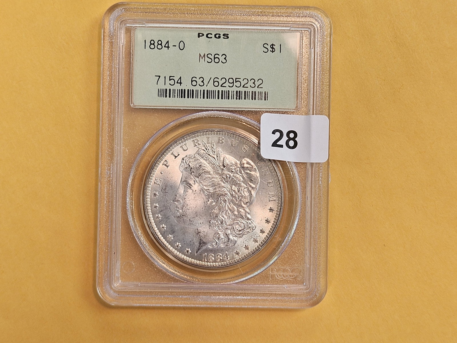 OGH! PCGS 1884-O Morgan Dollar in Mint State 63 - 2