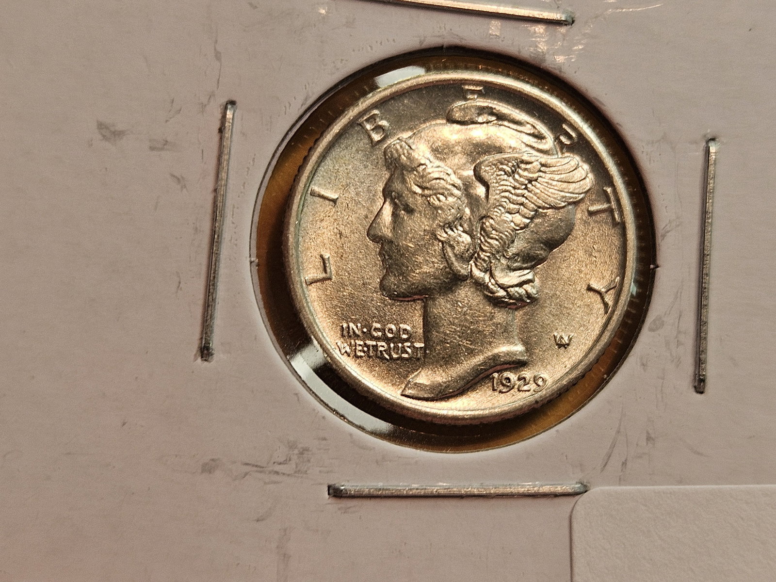 Four better grade silver Mercury Dimes - 4