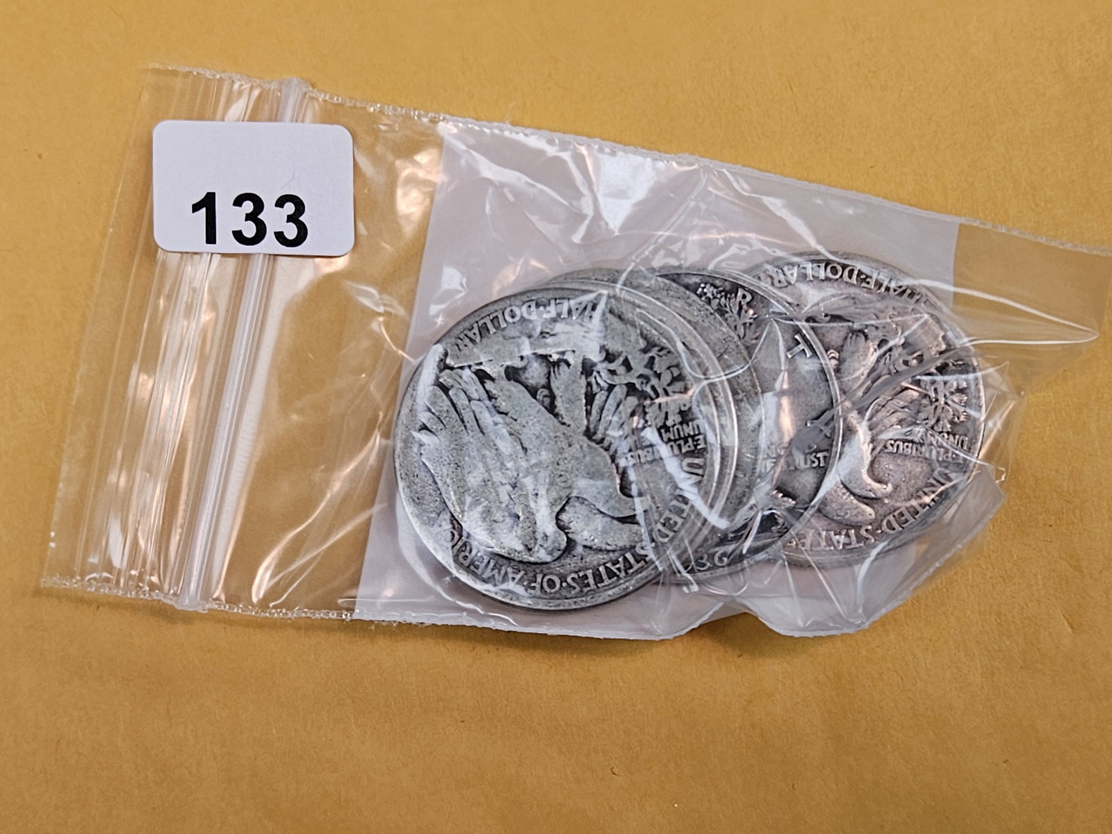 Five mixed silver Walking Liberty Half Dollars: Circulated
