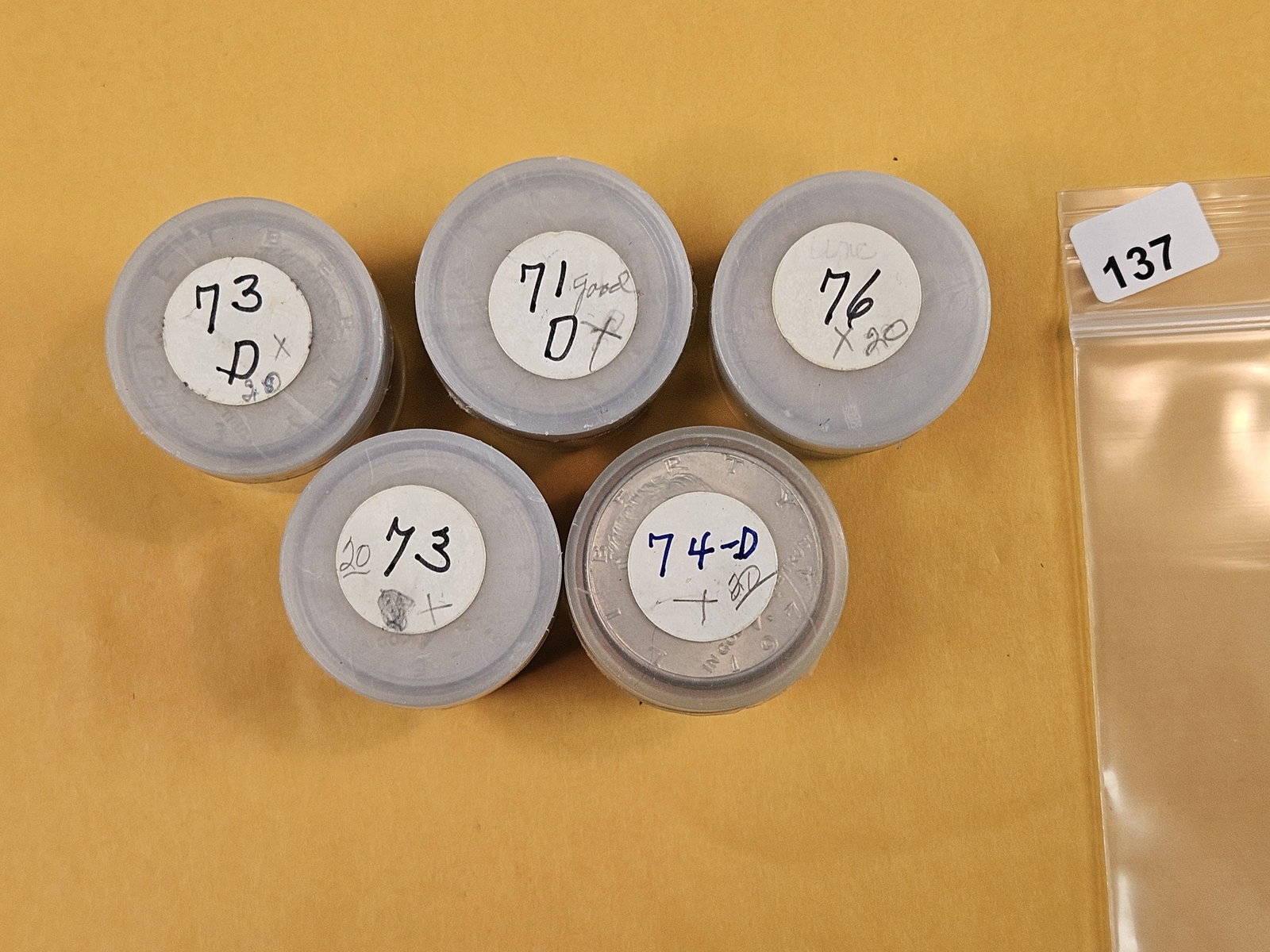 Five mixed, Brilliant Uncirculated Rolls of Kennedy Half Dollars: Unopened by us. Unsearched by us. Came in a large estate. Happy hunting!