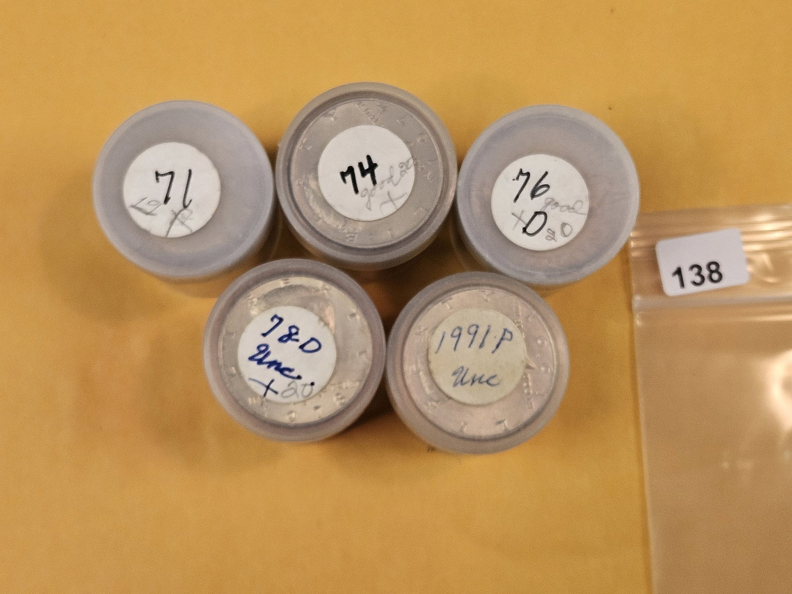 Five mixed, Brilliant Uncirculated Rolls of Kennedy Half Dollars: Unopened by us. Unsearched by us. Came in a large estate. Happy hunting!