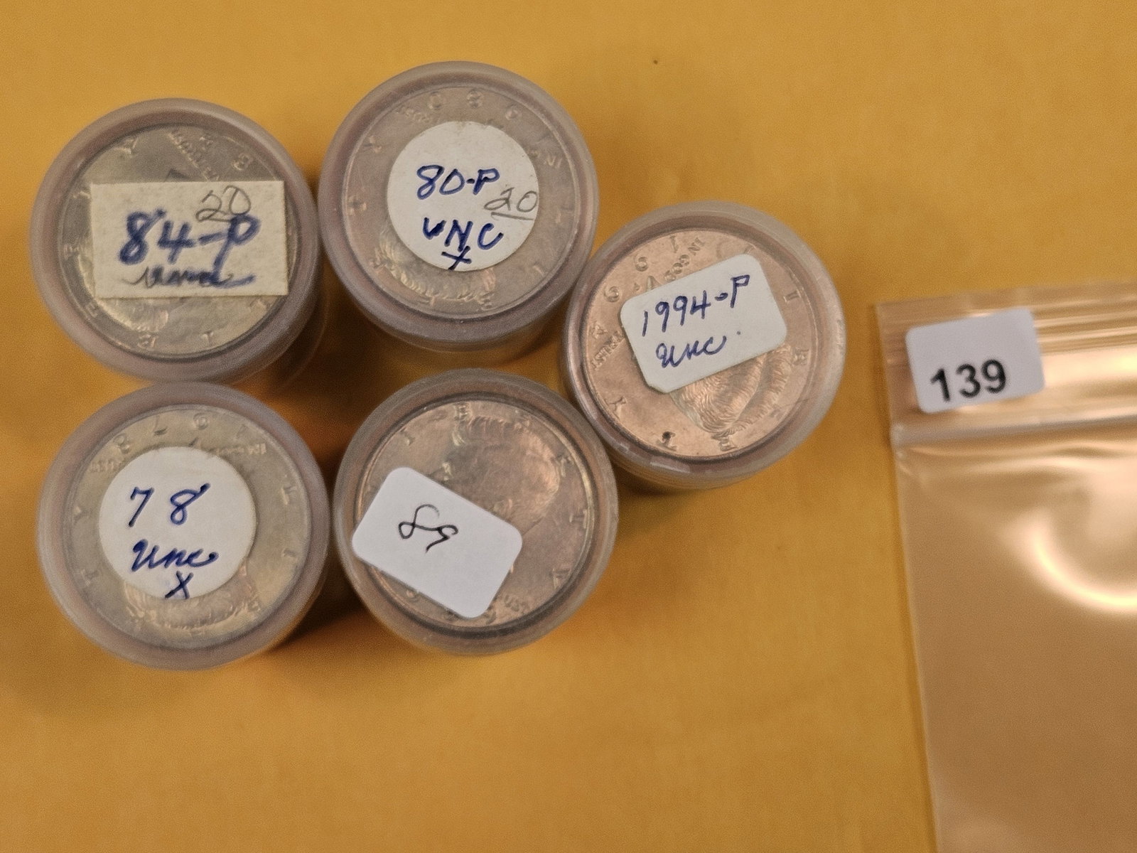 Five mixed, Brilliant Uncirculated Rolls of Kennedy Half Dollars: Unopened by us. Unsearched by us. Came in a large estate. Happy hunting!