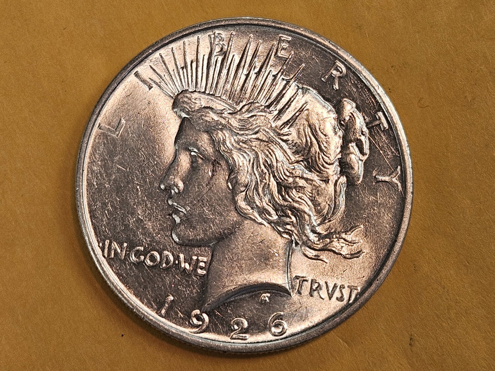 * Choice Brilliant Uncirculated 1926-D Peace Silver Dollar: Outstanding luster