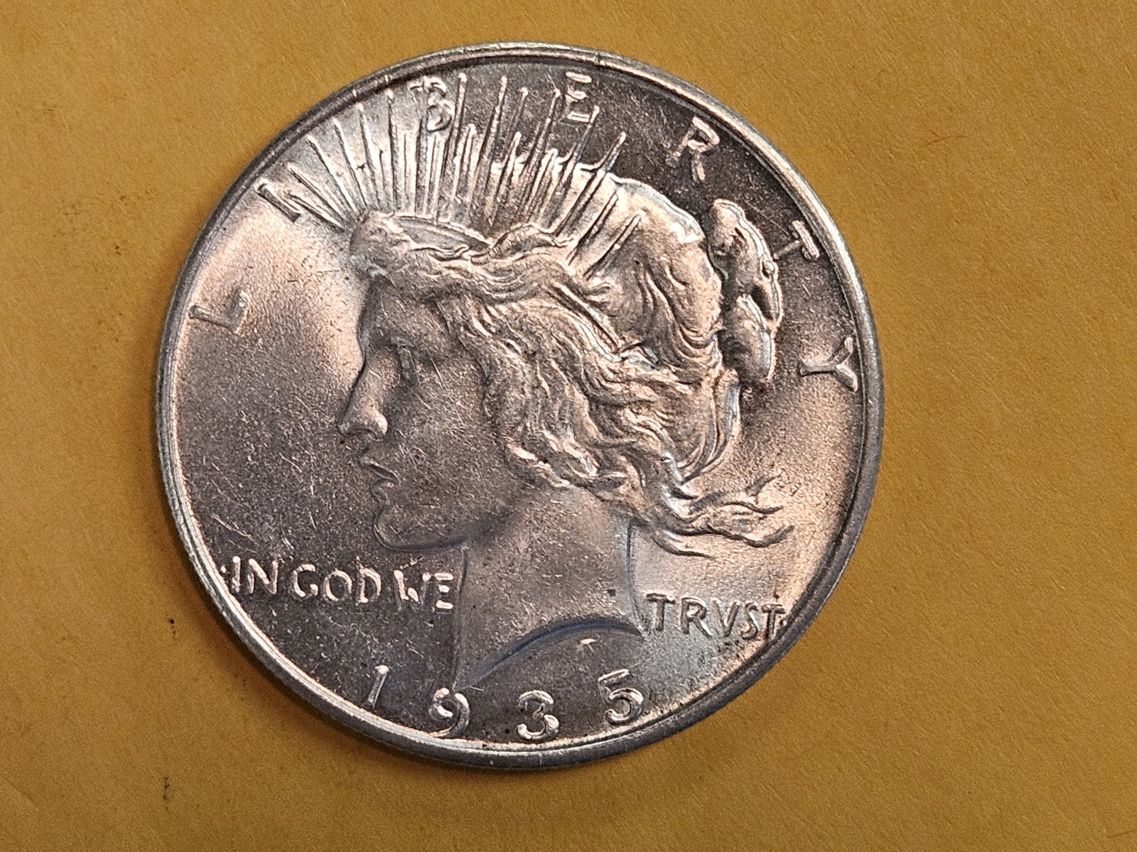 * Very Choice Brilliant Uncirculated 1935 Peace Silver Dollar: Very Clean fields! Purt near GEM!