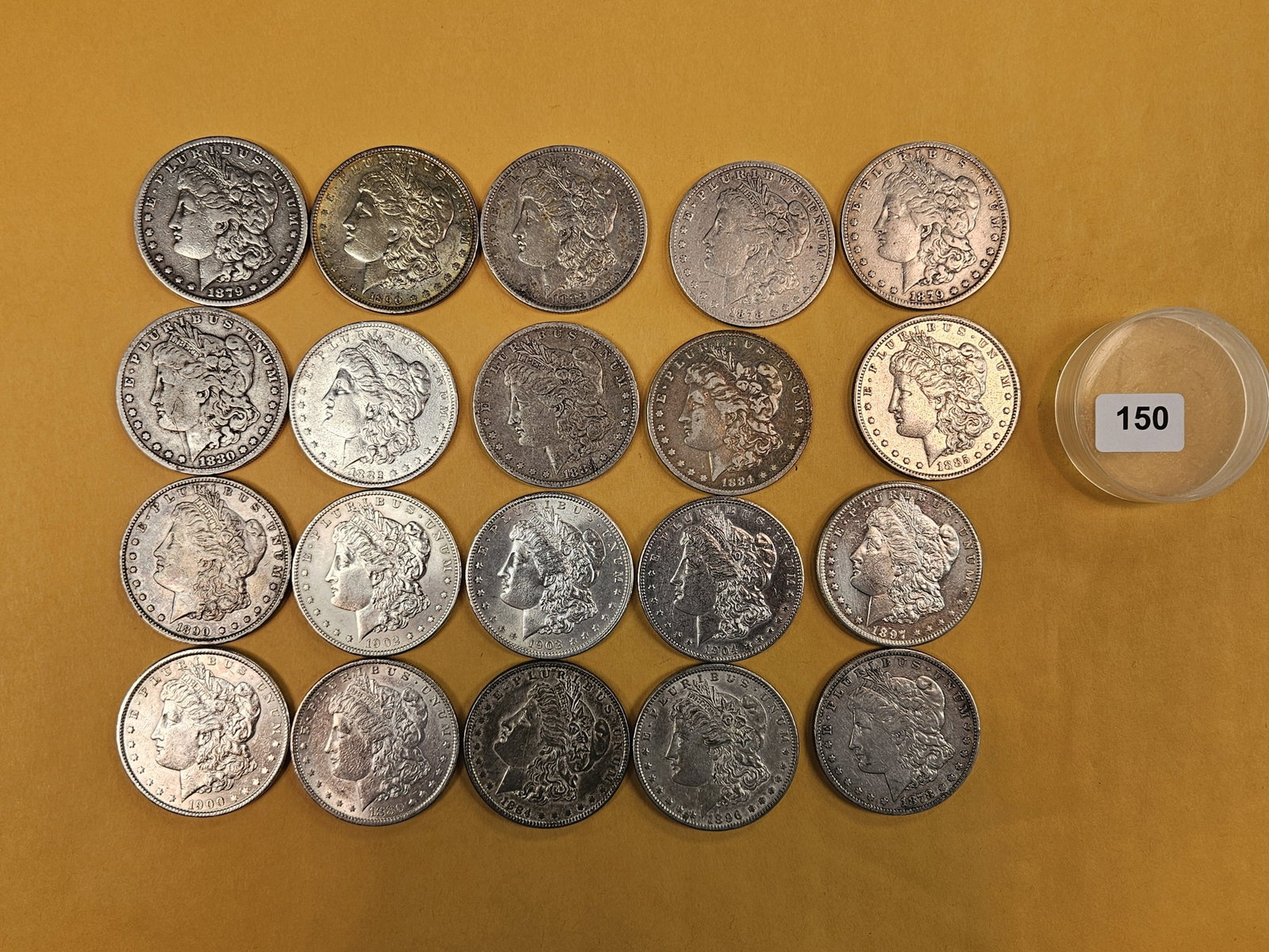 ** FULL ROLL ** Twenty Morgan Silver Dollars: All Pre-1904. Grades from Fine through Choice Brilliant Uncirculated - details