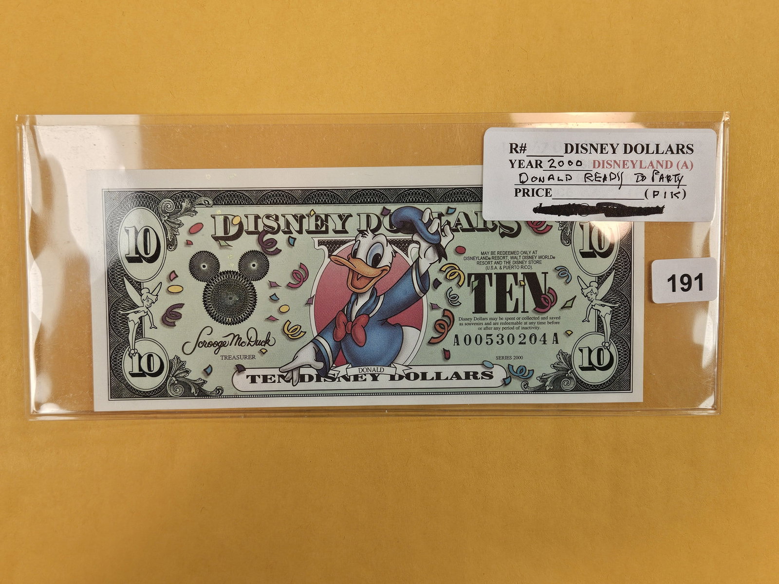 DISNEY DOLLAR! Crisp Uncirculated 2000-A TEN Dollar: Donald Ready to Party