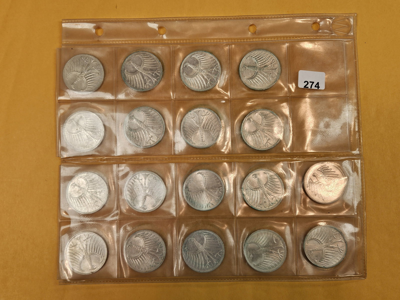 Eighteen SILVER German coins: In a pvc plastic holder