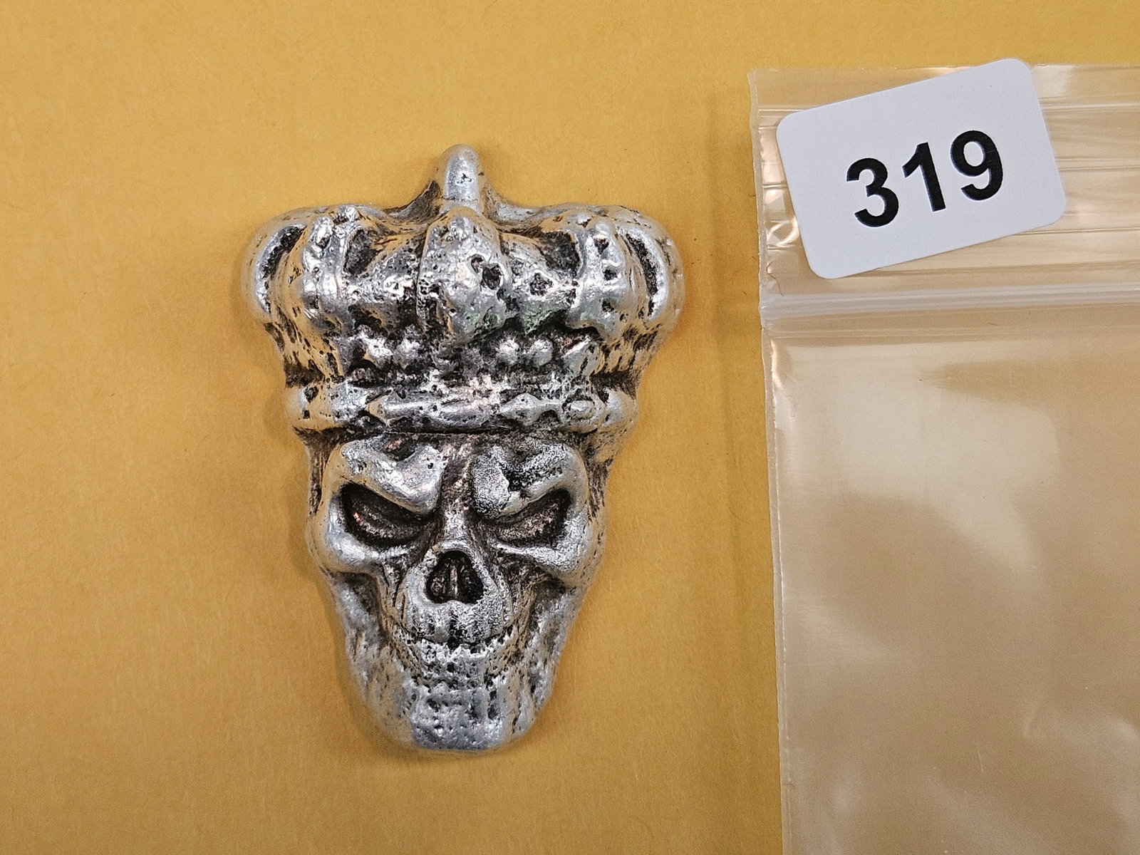 Cool! Poured Silver Art piece: Weighs One Hundred and Four Grams! About 3.4 troy ounces. Skull with a crown on it