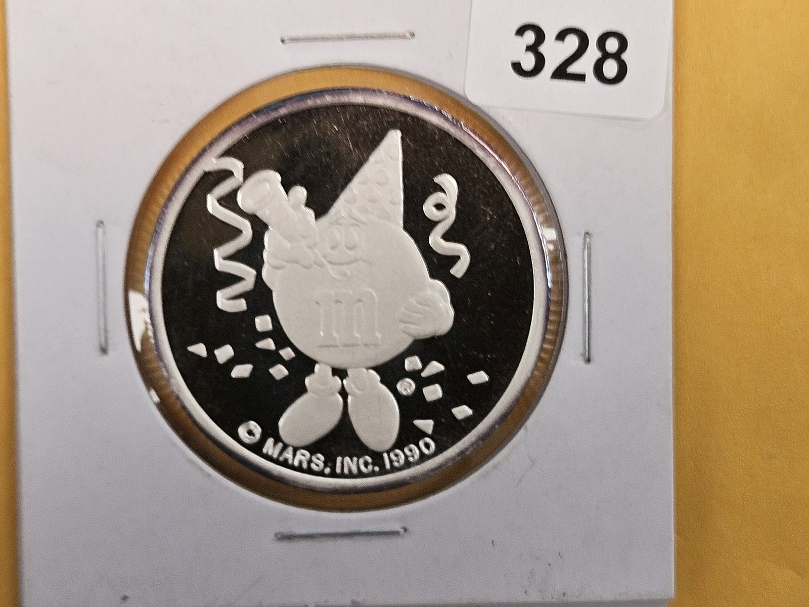 One Troy Ounce .999 fine silver Proof art round: M & M's! Melts in your mouth, not in your hands