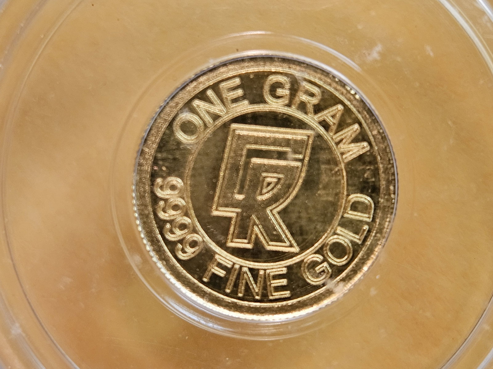 GOLD! PERFECT! ICG-graded Clean Ripz .9999 fine gold Prooflike Art round: Perfect Grade! MS-70 Prooflike. No Date. One Gram
