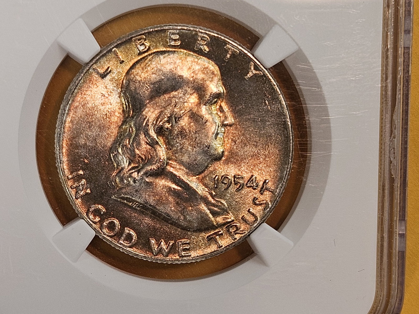 NGC 1954 Franklin silver Half Dollar in Mint State 64 FBL: Full Bell Lines. Nice obverse patina