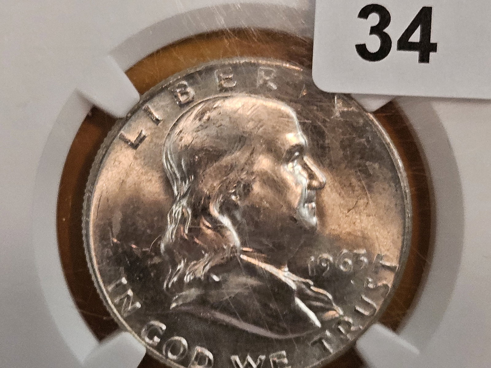 NGC 1963-D Franklin silver Half Dollar in Mint State 64: Great Luster