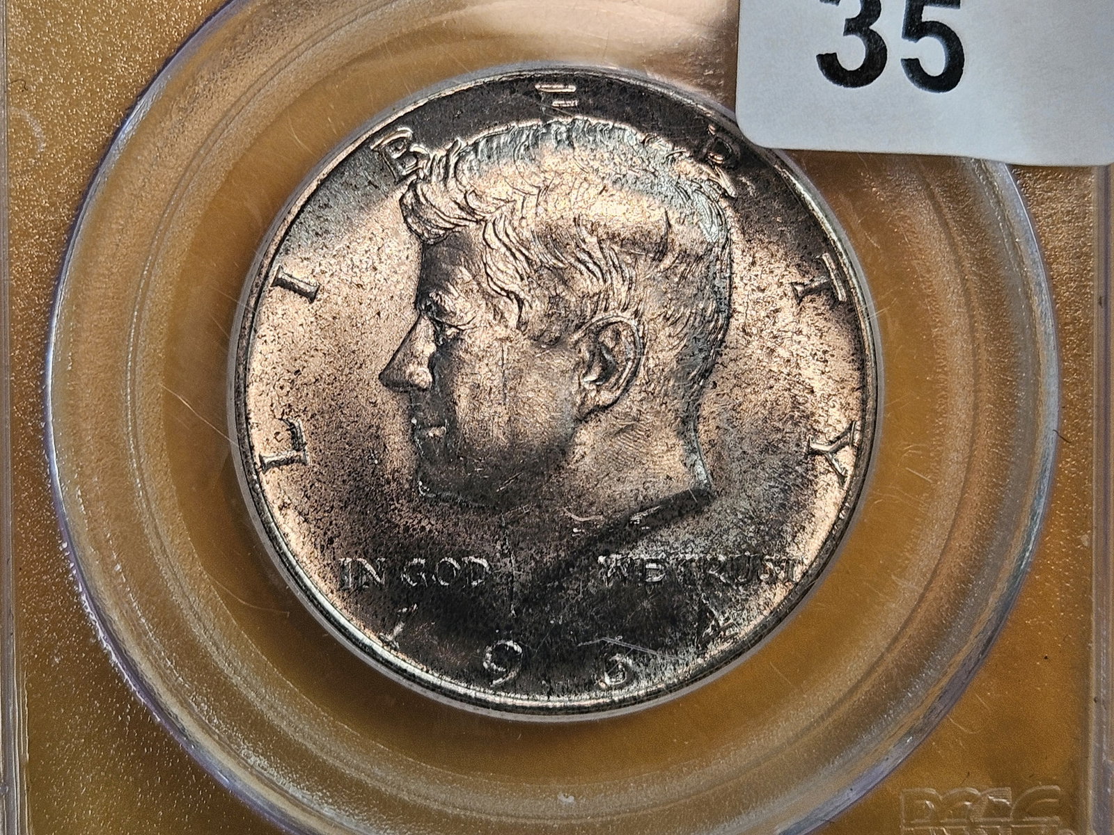 PCGS 1964-D Franklin silver Half Dollar in Mint State 64: Nicely toned