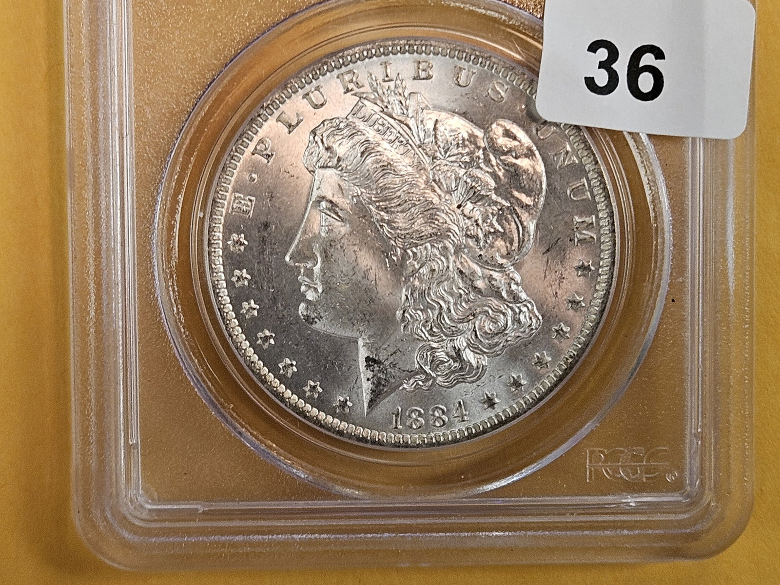 PCGS 1884-O Morgan Dollar in Mint State 64: Frosty
