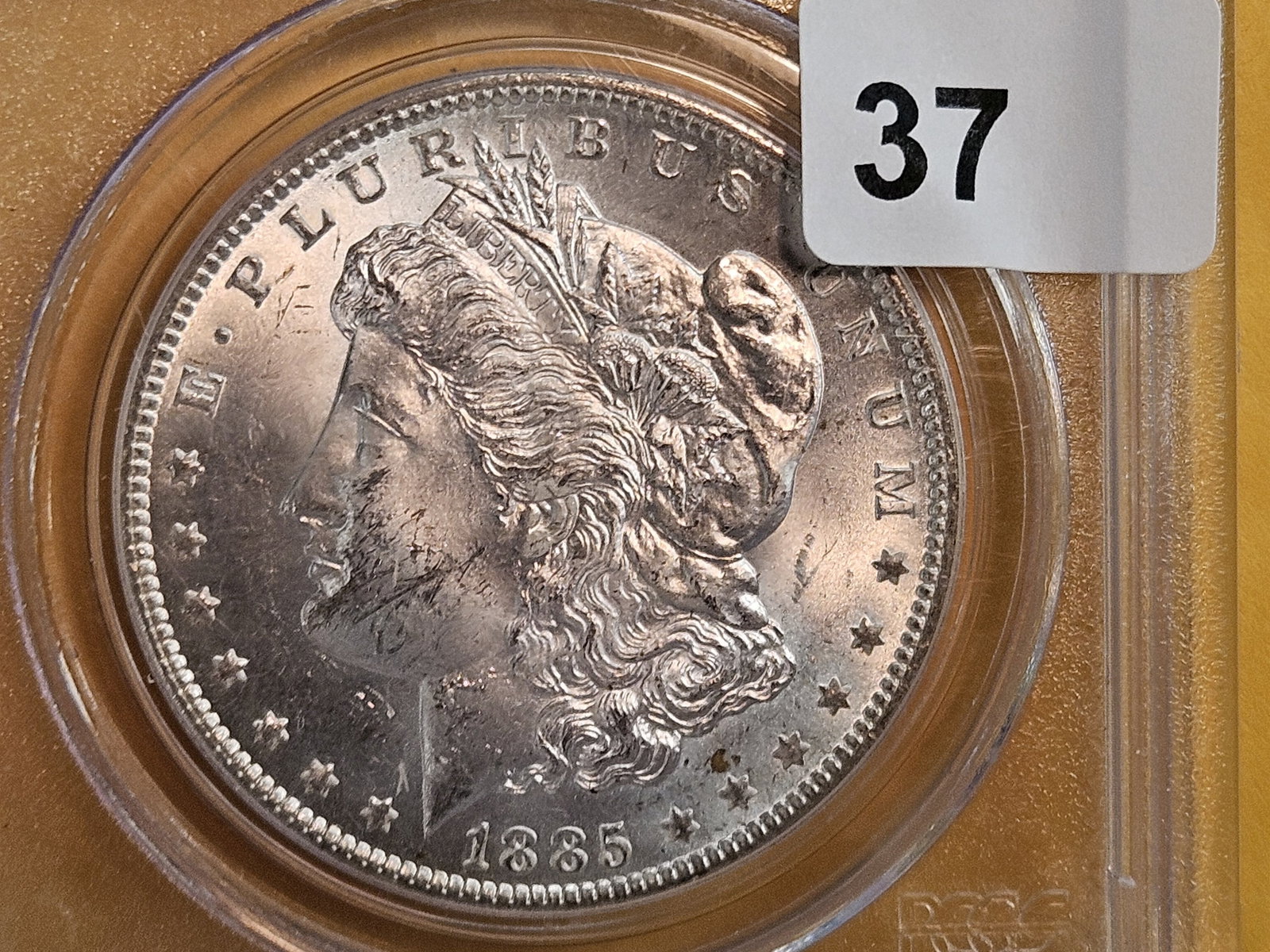 PCGS 1885-O Morgan Dollar in Mint State 64: Very nic