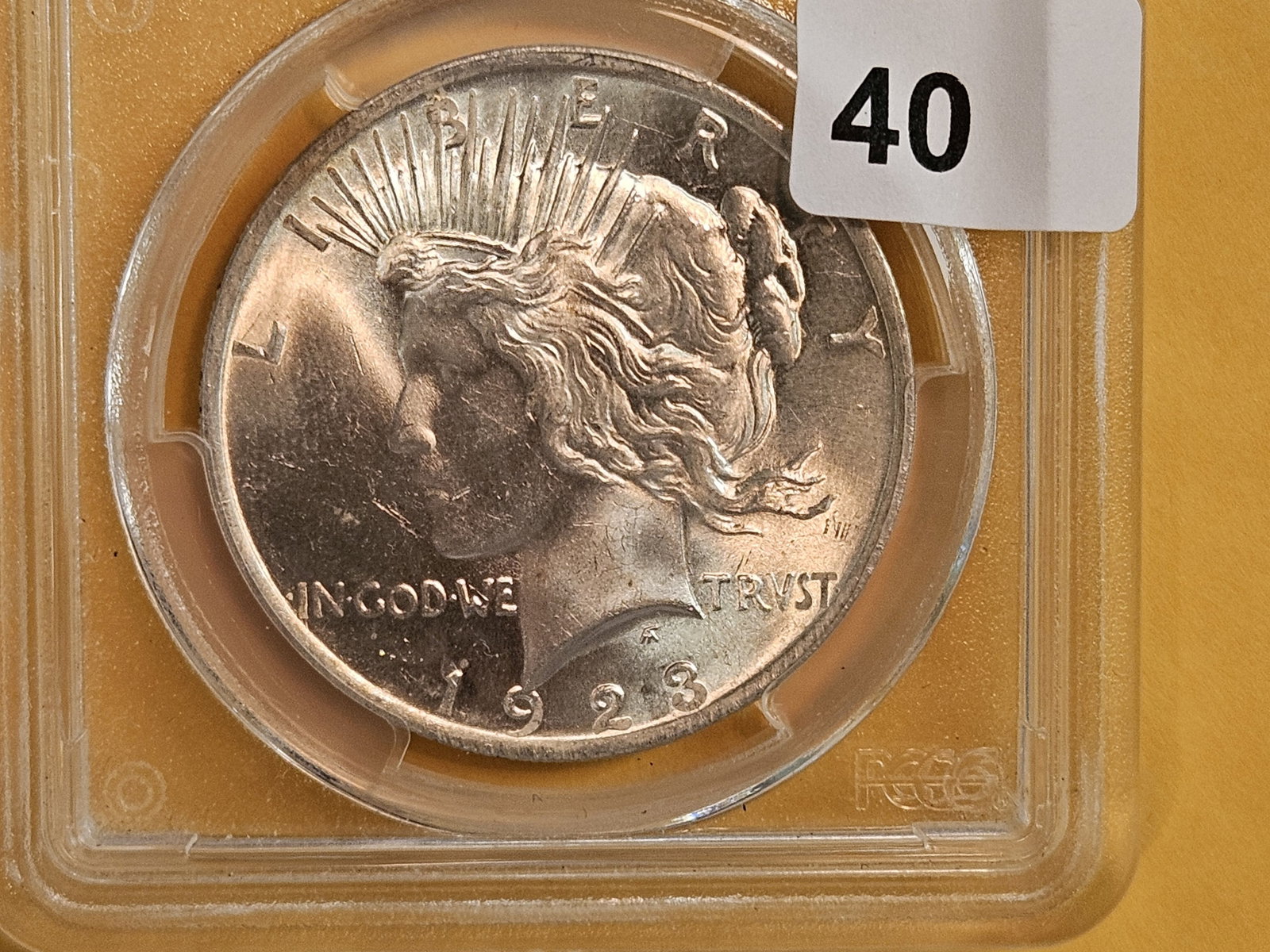 PCGS 1923 Peace Silver Dollar in Mint State 64: Outstanding luster!