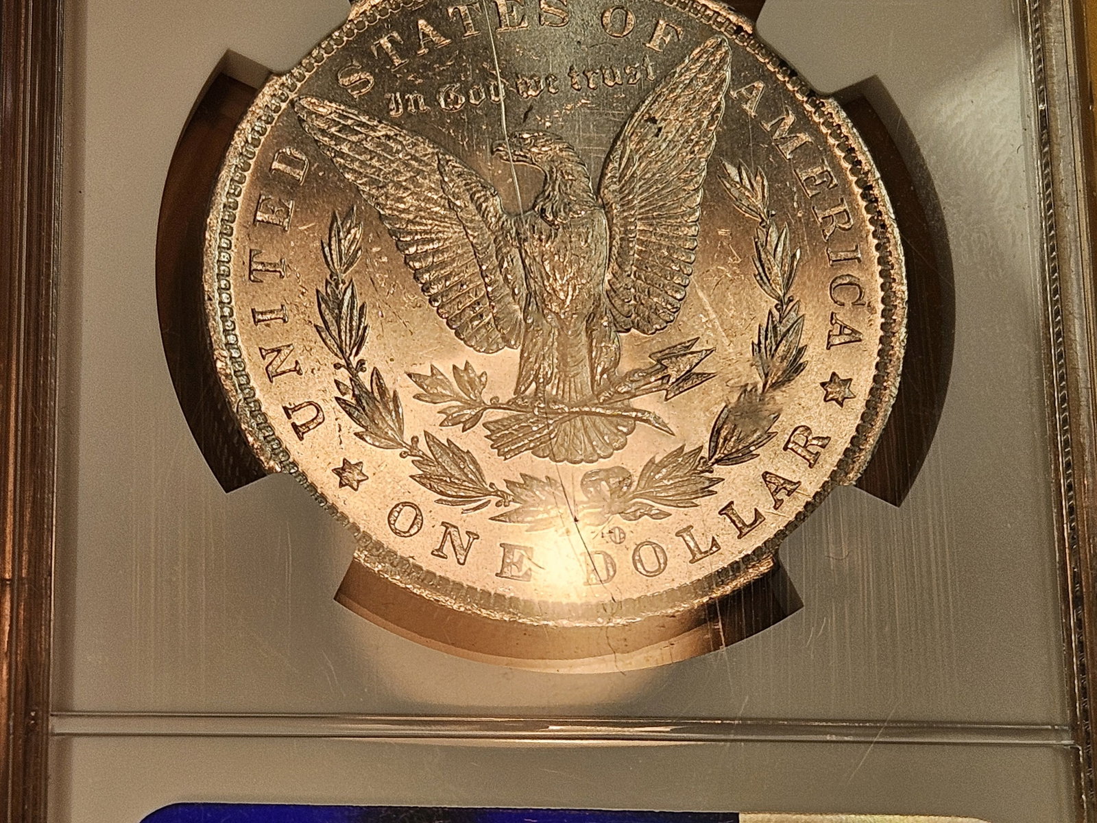 NGC 1883-O Morgan Dollar in Mint State 63 - 7