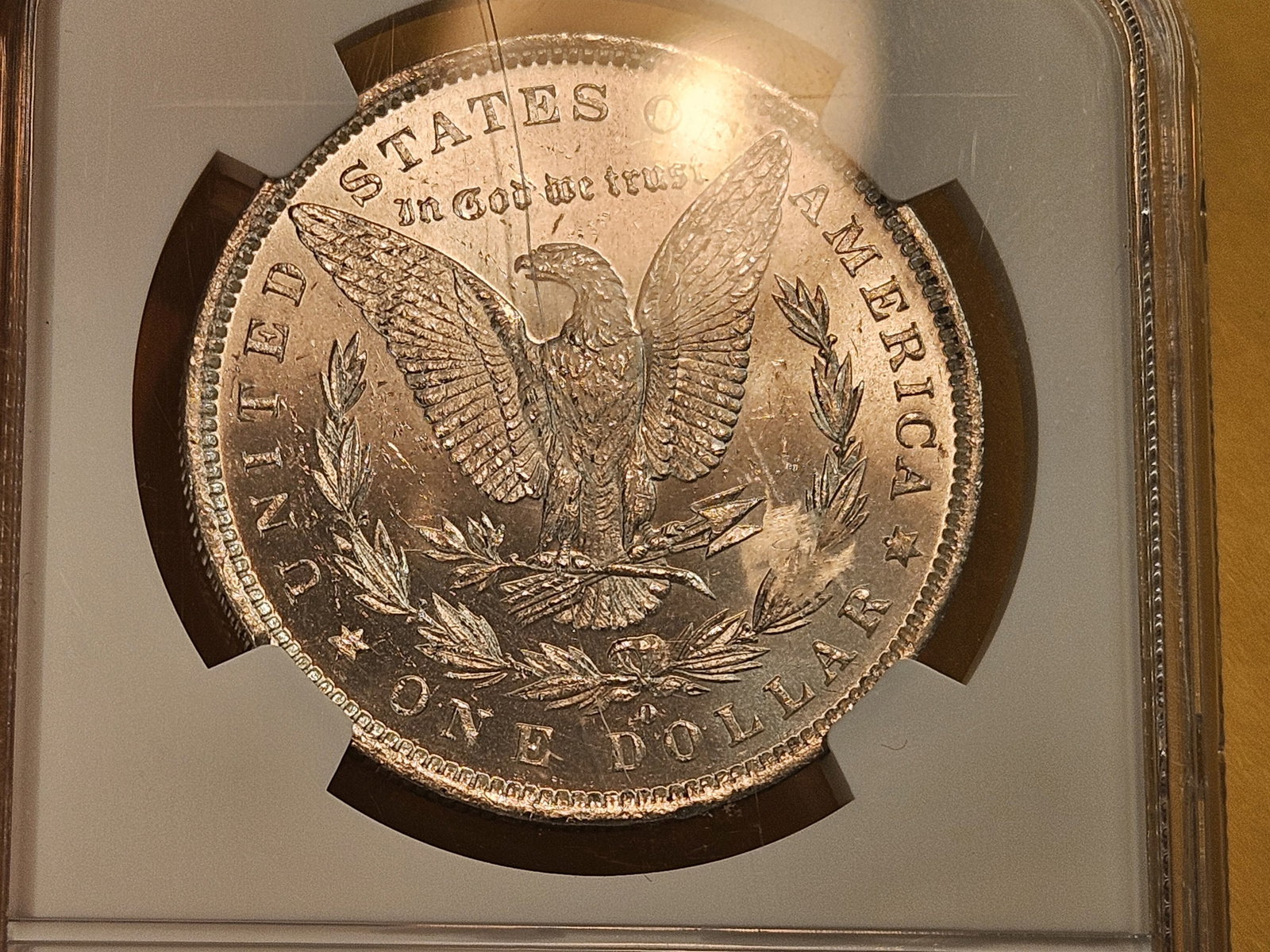 NGC 1883-O Morgan Dollar in Mint State 63 - 9