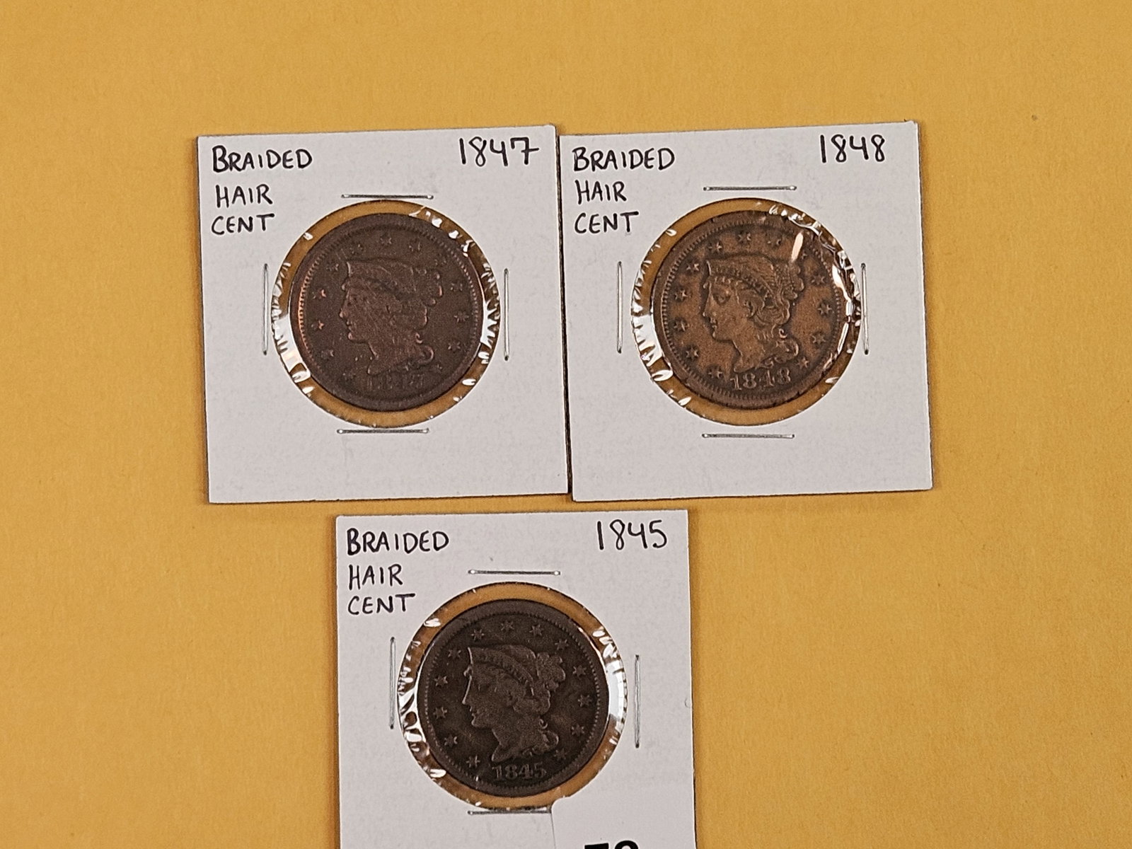 Three Braided Hair Large Cents: Light mark on the cheek