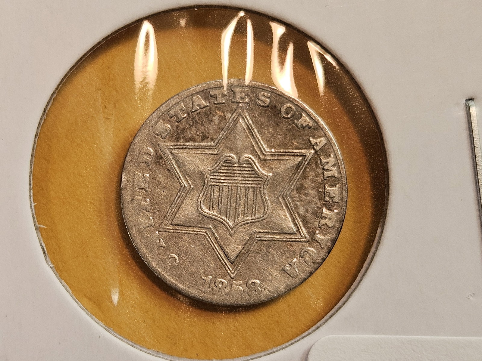 1858 Three Cent silver Trime: In Very Fine plus