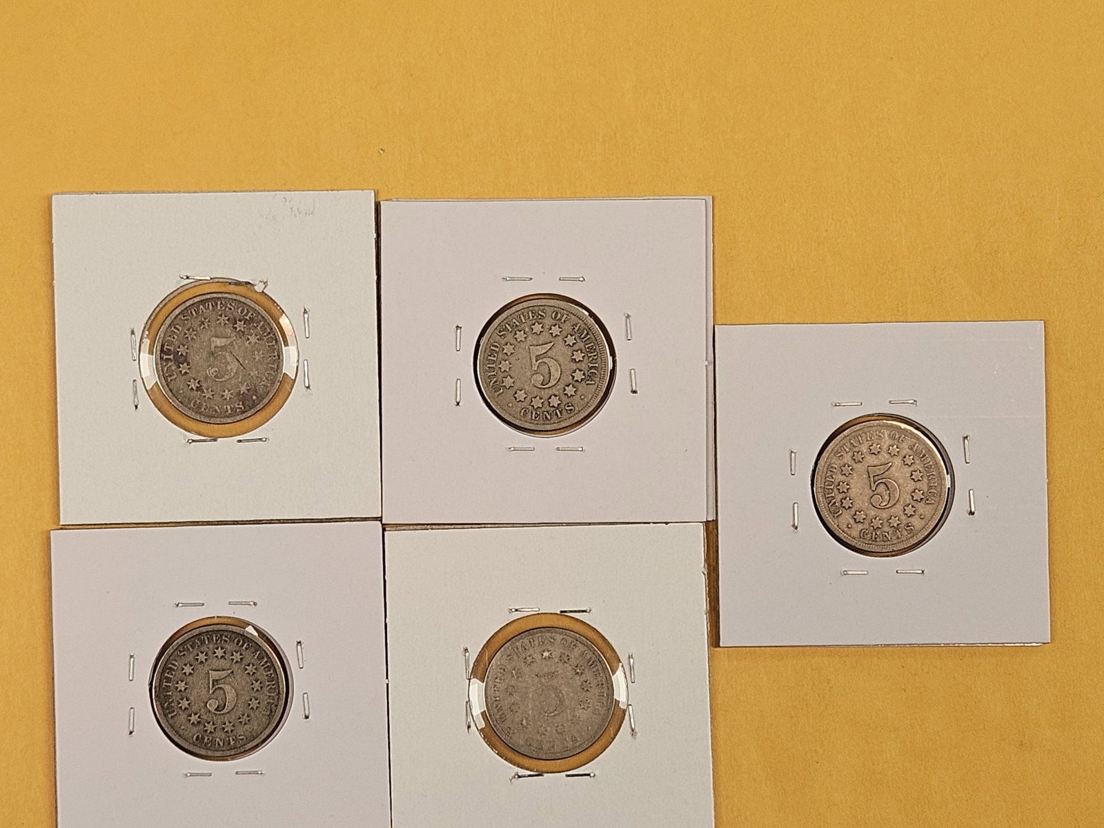 Five mixed Shield Nickels - 5