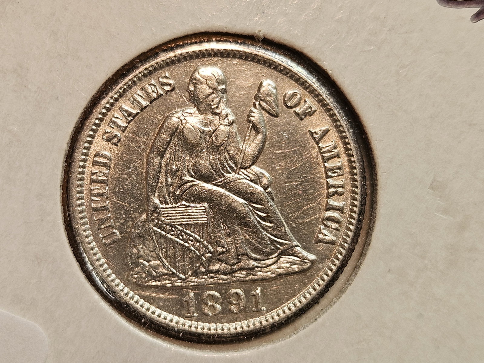 1891-S Seated Liberty Silver Dime in Brilliant About Uncirculated plus - details: Bright