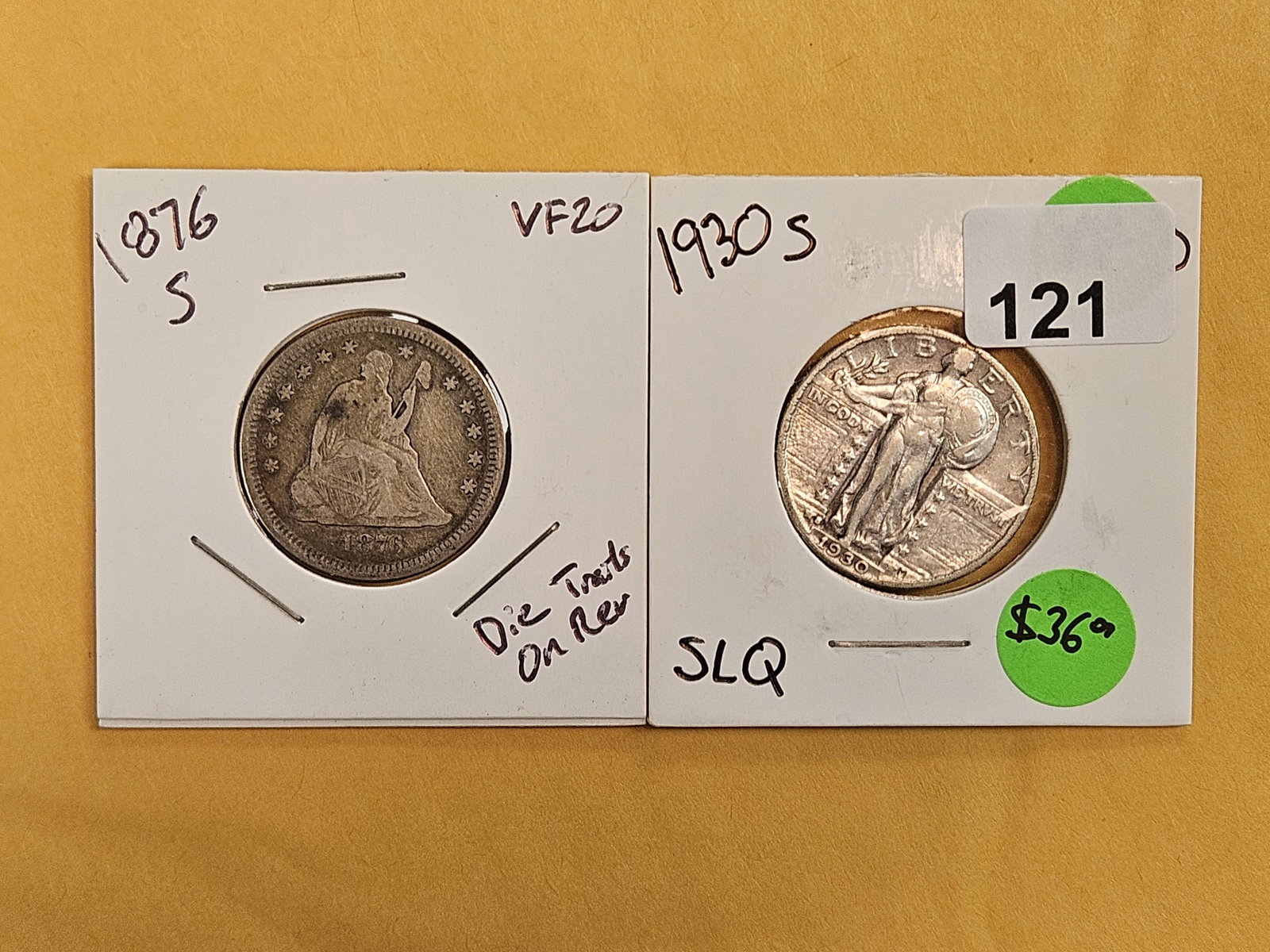 Two different designed San Francisco-minted silver quarters: 1876-S Seated and 1930-S Standing Liberty
