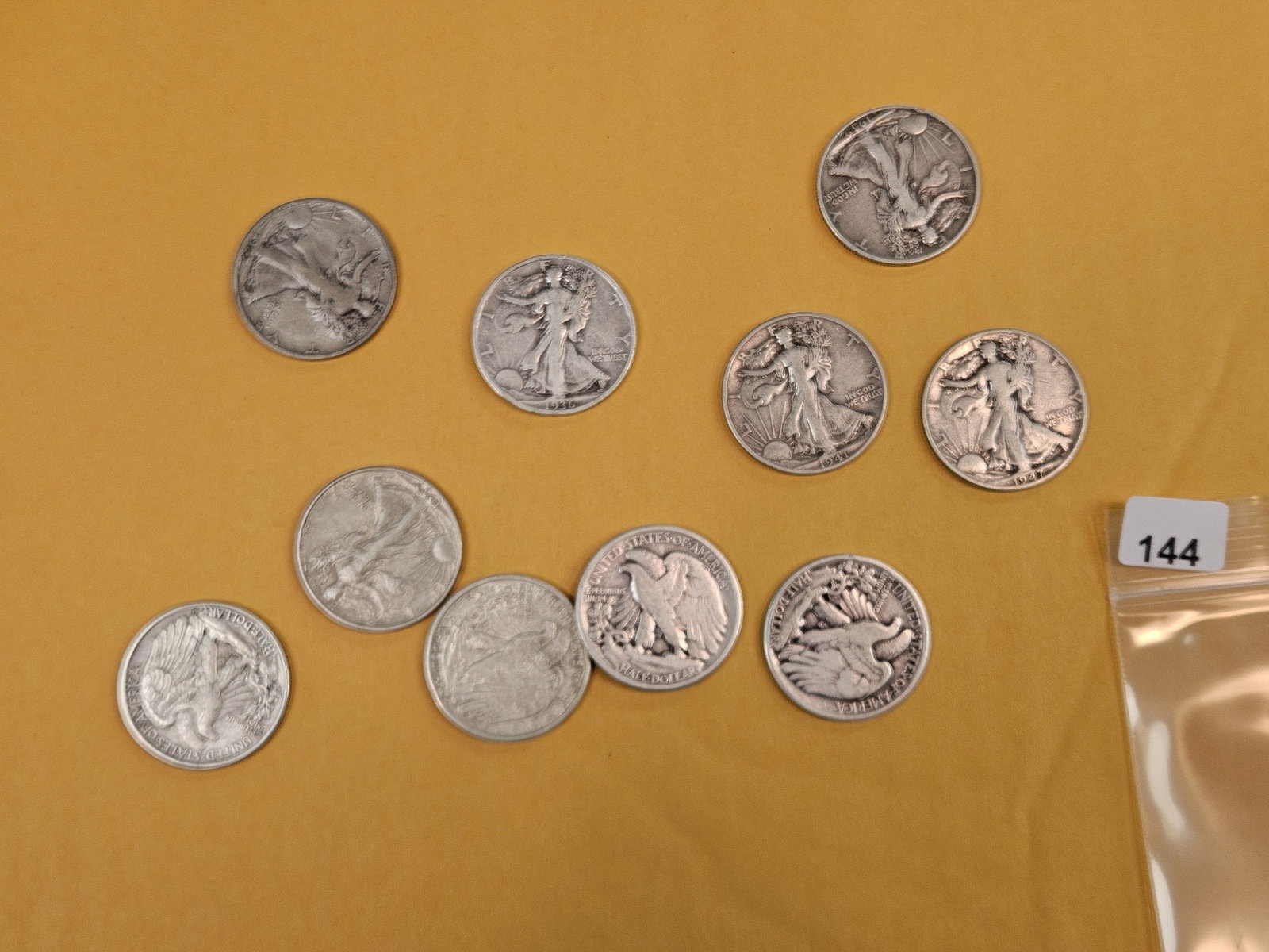 Ten mixed, silver, Walking Liberty half dollars: Circulated