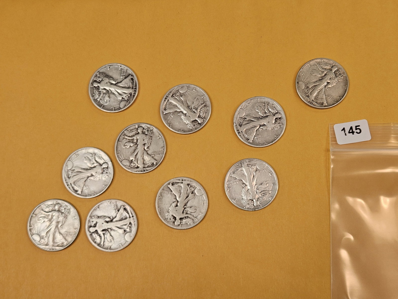 Ten mixed, silver, Walking Liberty half dollars: Circulated