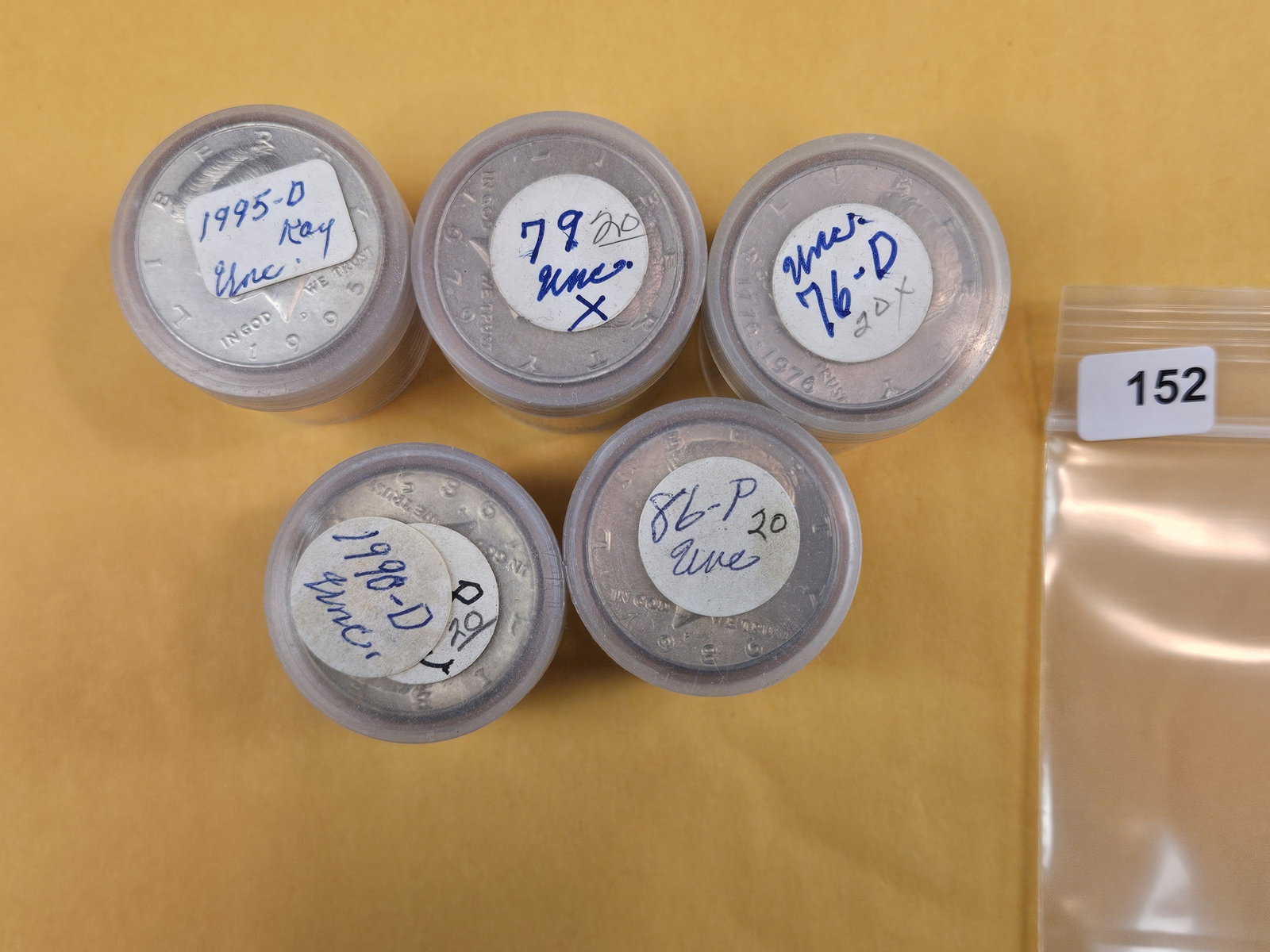 Five, mixed, Brilliant Uncirculated Kennedy half Dollar Rolls: From an old collection. We didn't open or search