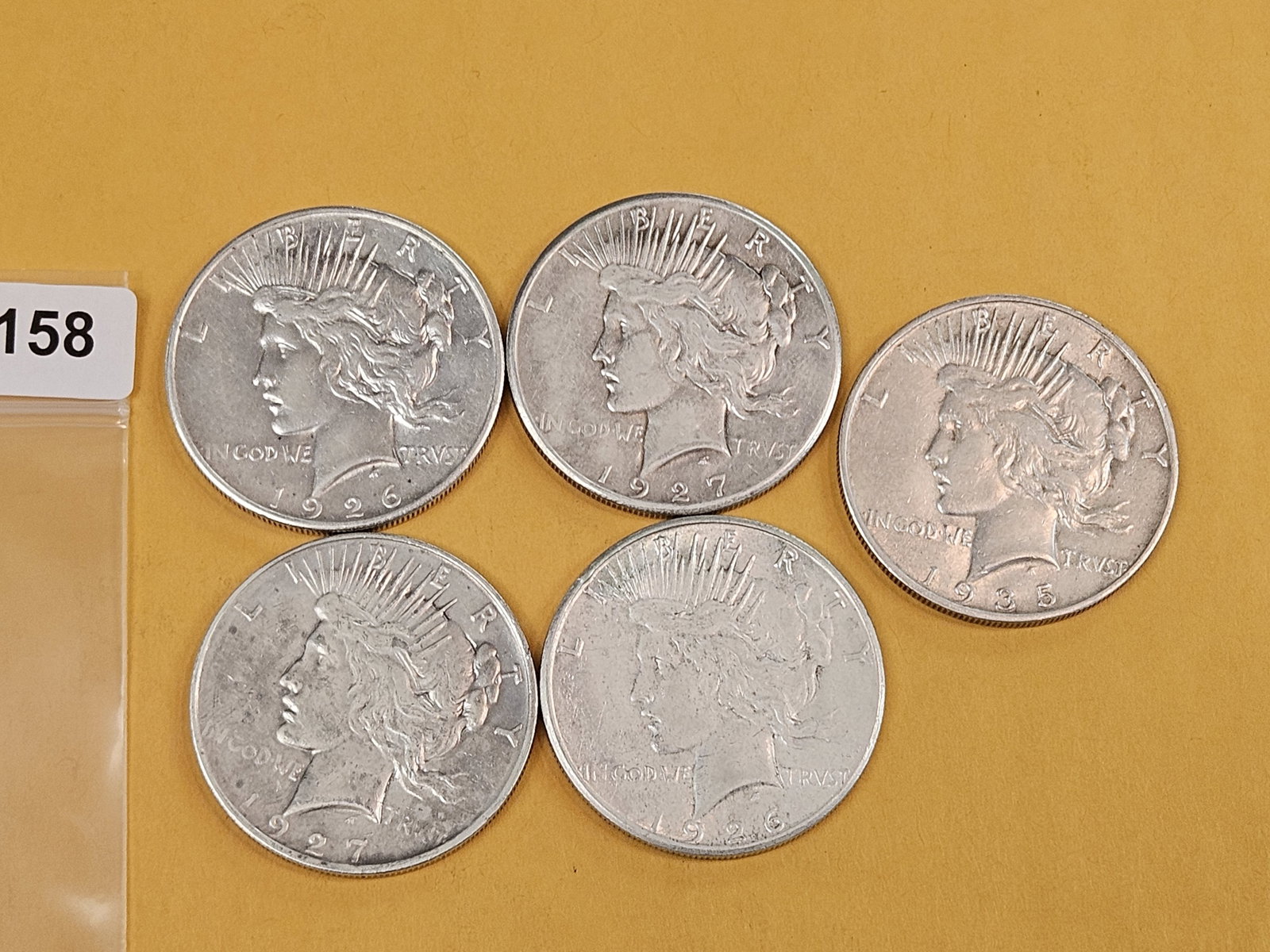 Five mixed silver Peace Dollars - 2