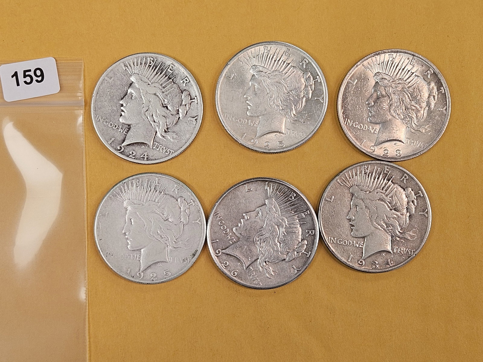Six mixed silver Peace Dollars: Circulated