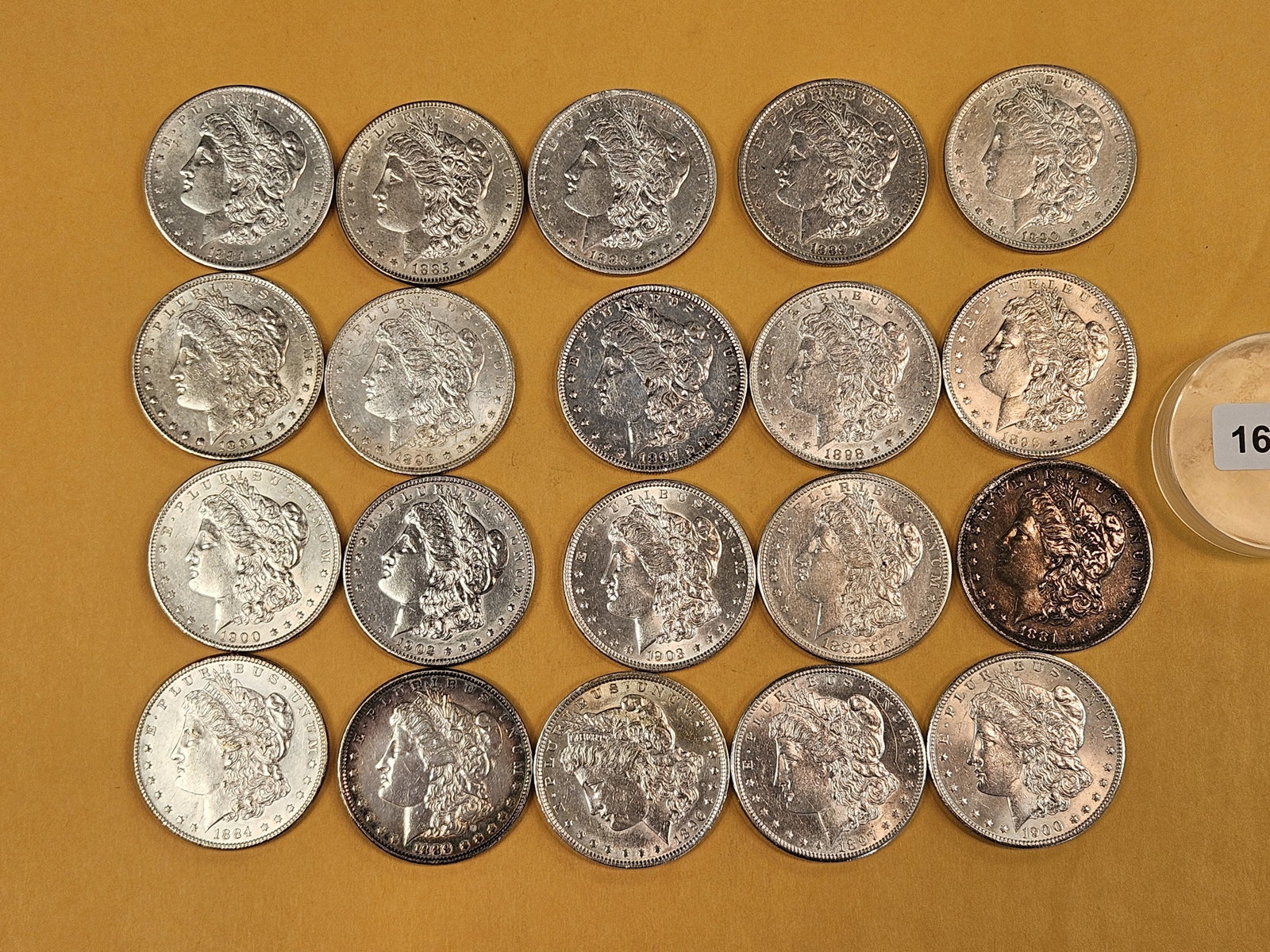 ** FULL ROLL ** Twenty Morgan Silver Dollars: All pre-1904. Grades from Brilliant About Uncirculated through Choice Brilliant Uncirculated plus - details