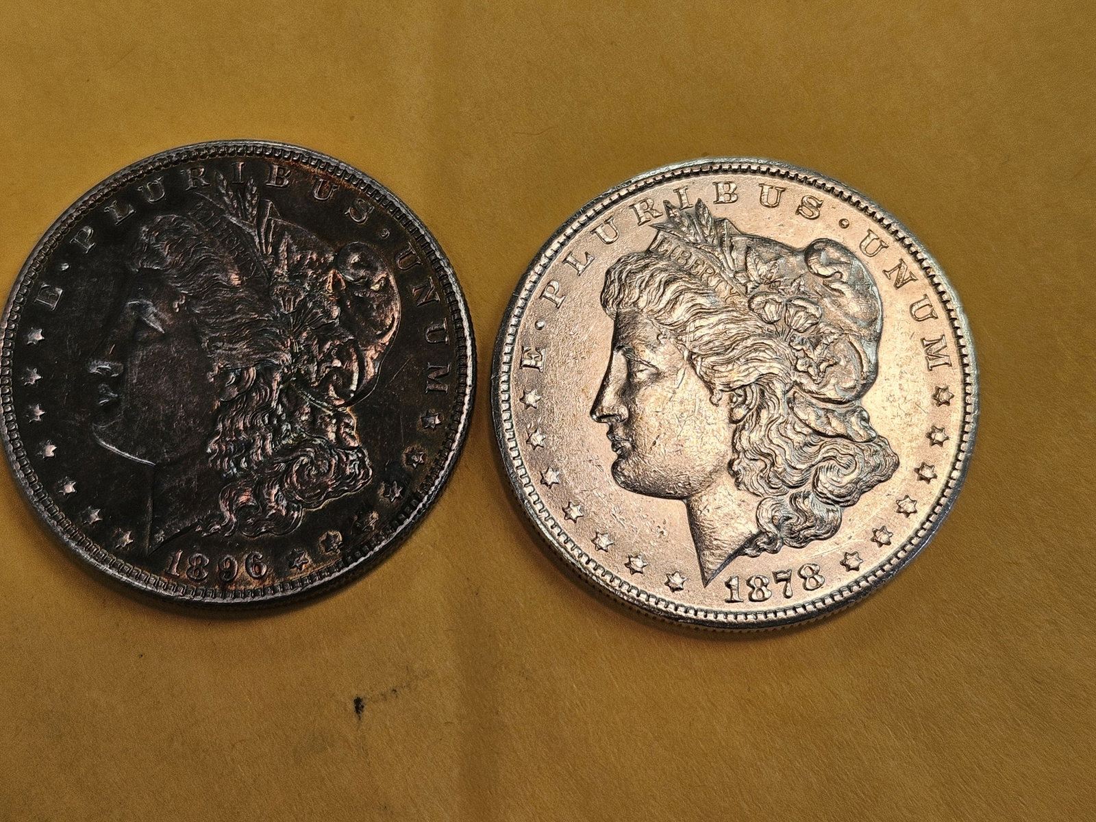 Two Brilliant About Uncirculated Morgan silver Dollars: Mixed